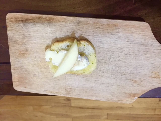 Serve with desired toppings. In this photo the crostini is served with Brie, Honecrisp apple slice and stone ground mustard. ENJOY!