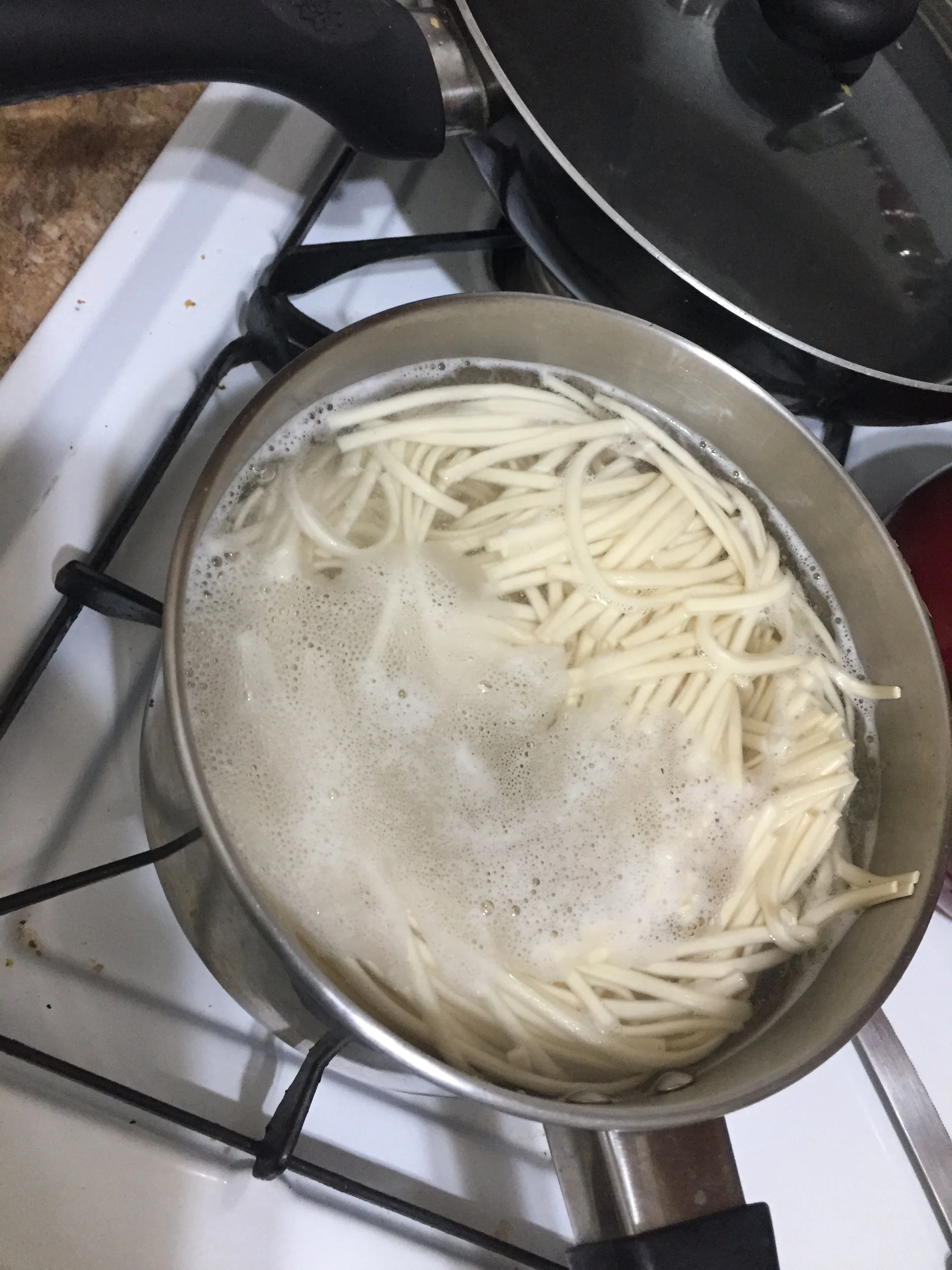 Bring 3 qt of water to boil and add the package of Kame noodles. When they rise to the top, cook for 9-11 more minutes and then drain. Rinse in cold water until noodles are room temperature-cool. Set aside