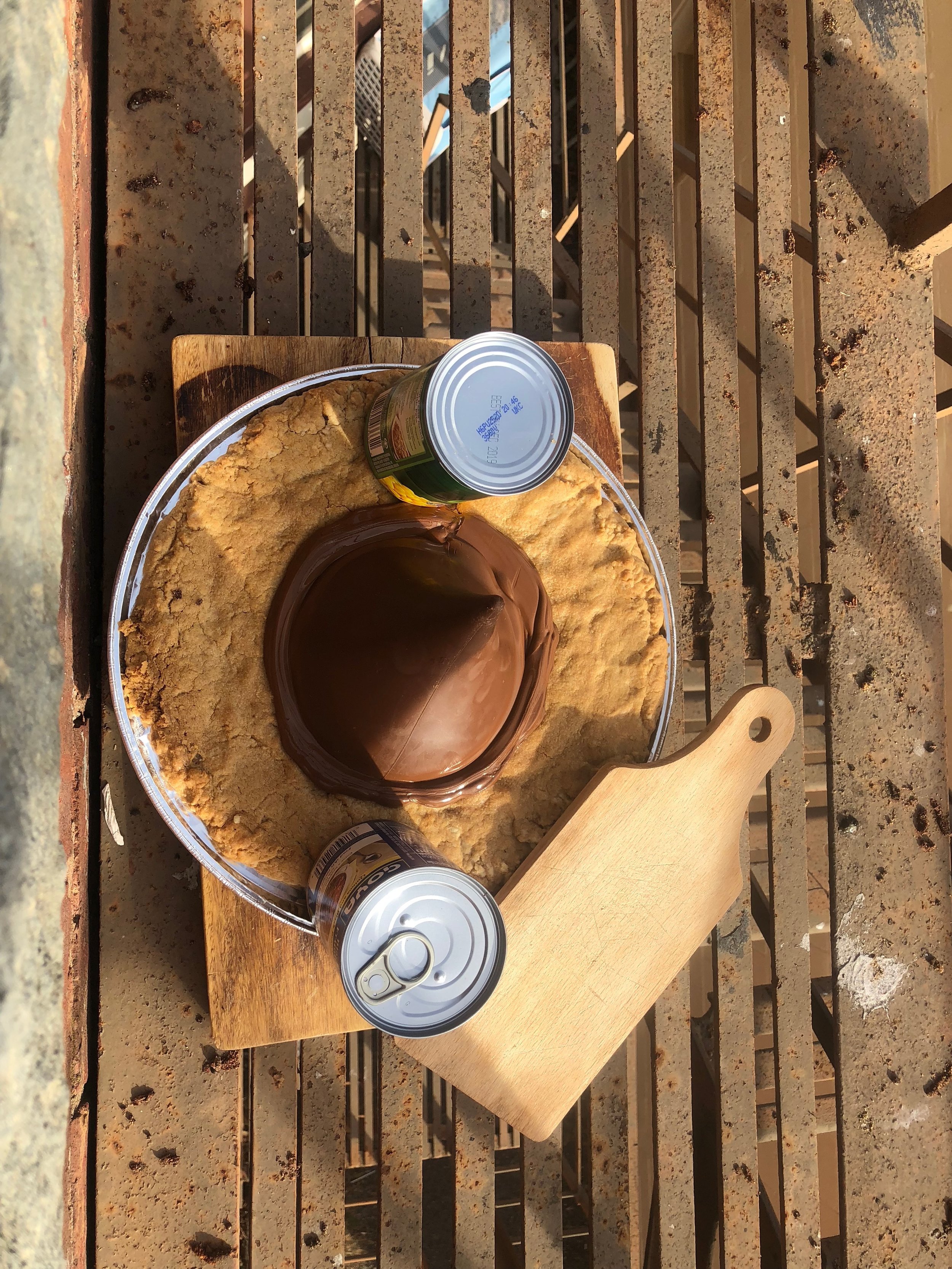 It kept melting so then I took off the top, put it in the freezer, put the cookie in the fridge...and then the freezer...and prayed!I took both pieces from the freezer, very cold, and then I melted the bottom of the kiss with a lighter and put them …