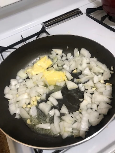 Add onions, butter and garlic to a medium saucepan&nbsp;