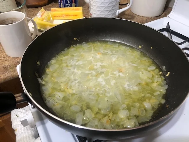 Add the vodka to the butter, onions and garlic. Cook for approximately 30 minutes.