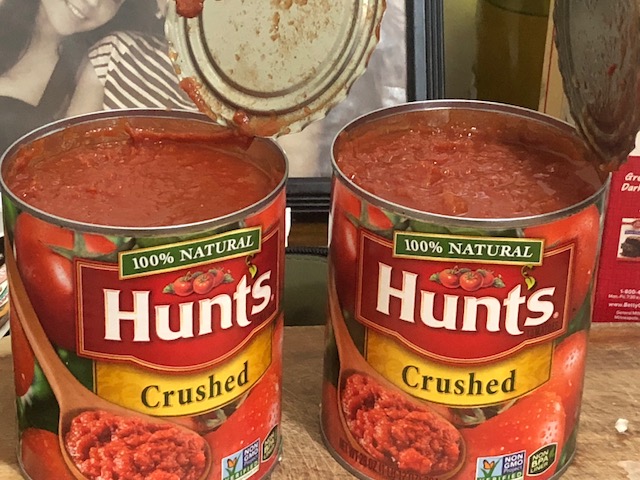 Open and add crushed tomatoes...