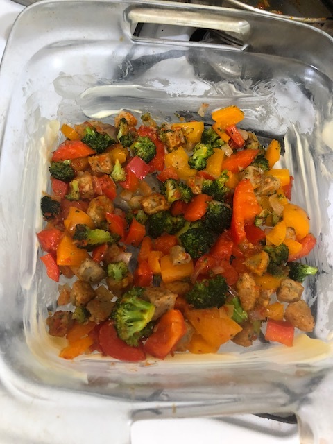 Pour the cooled vegetable and sausage mixture into your baking dish.