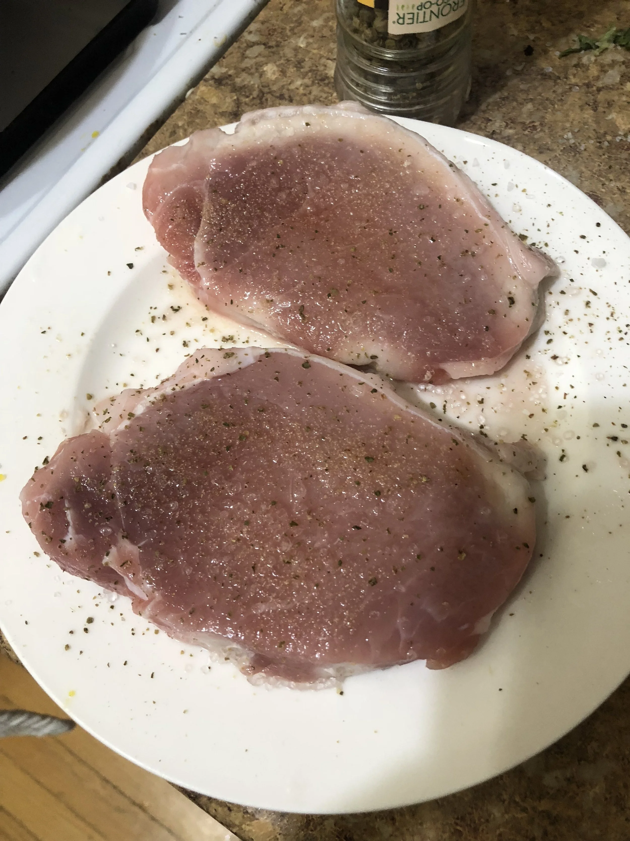 Season the pork chops on both sides with ground pepper and seasalt