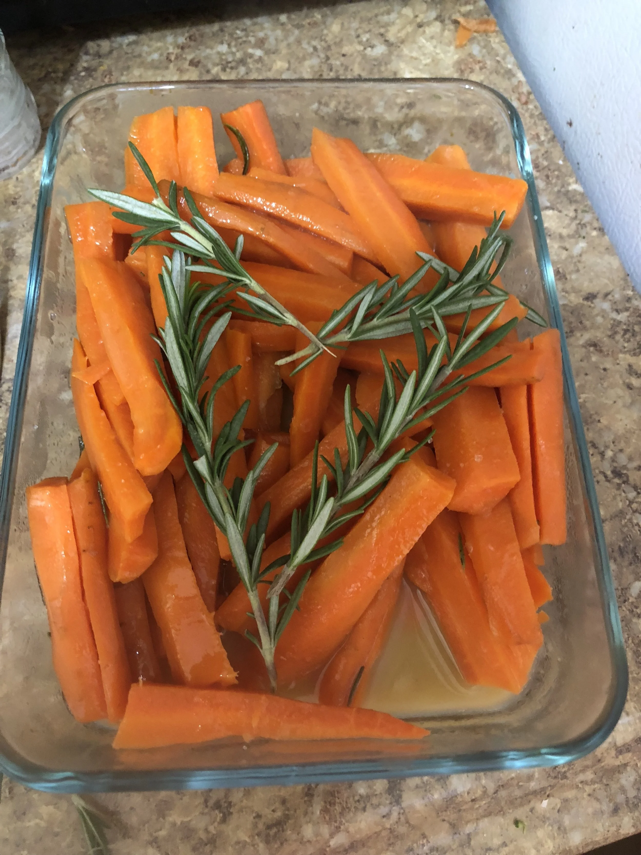 6-9 medium carrotssprig of rosemary2 tbls of butter3 tbls of honey3 tbls of brown sugarsalt and pepper (taste)Plan of AttackClean, peel and slice carrots, Place carrots in a medium sauce pan and cover with water. Add salt and bring to a boil. 
