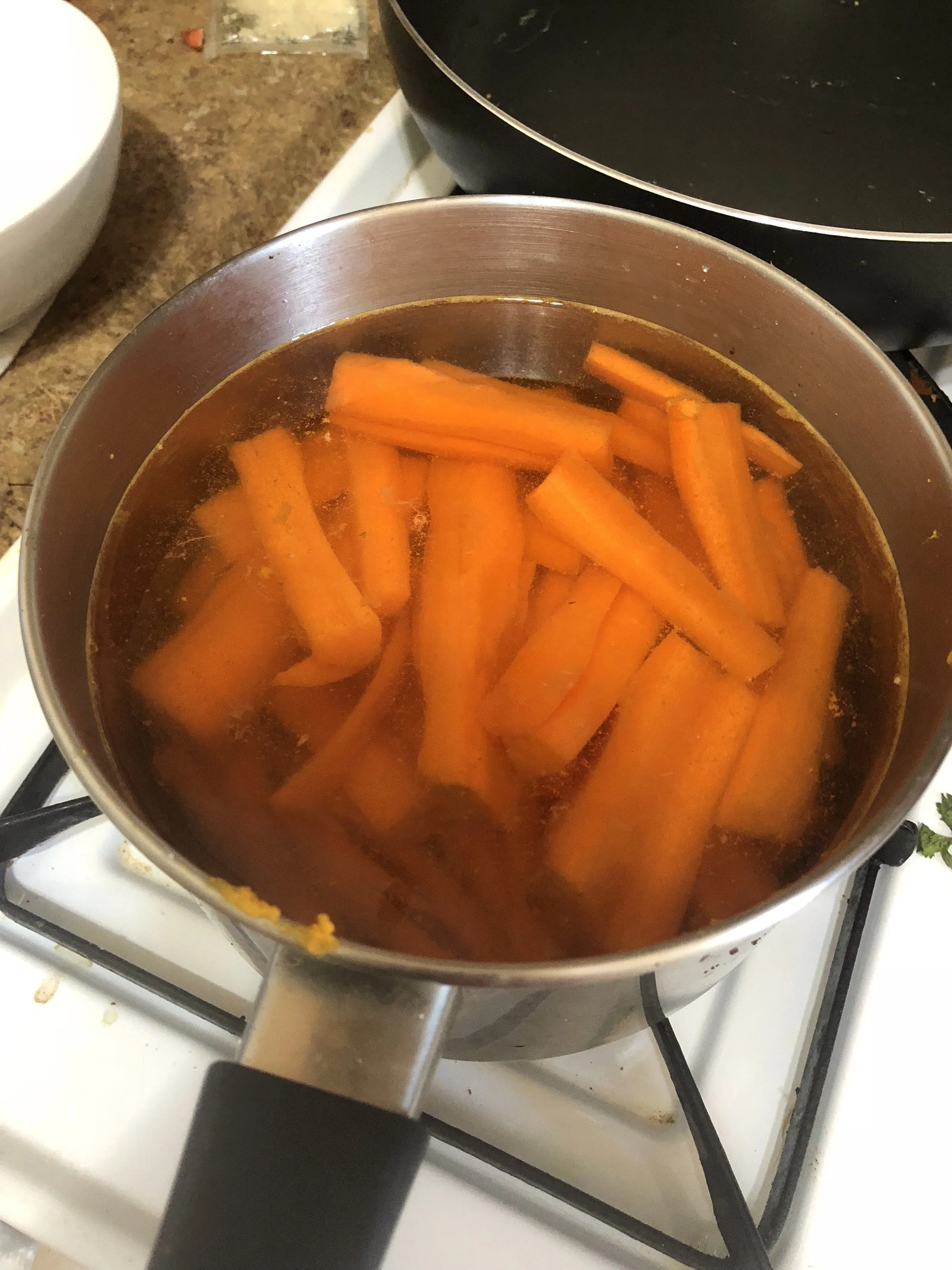 Bring carrots a boil, watching carefully so as not to overcook
