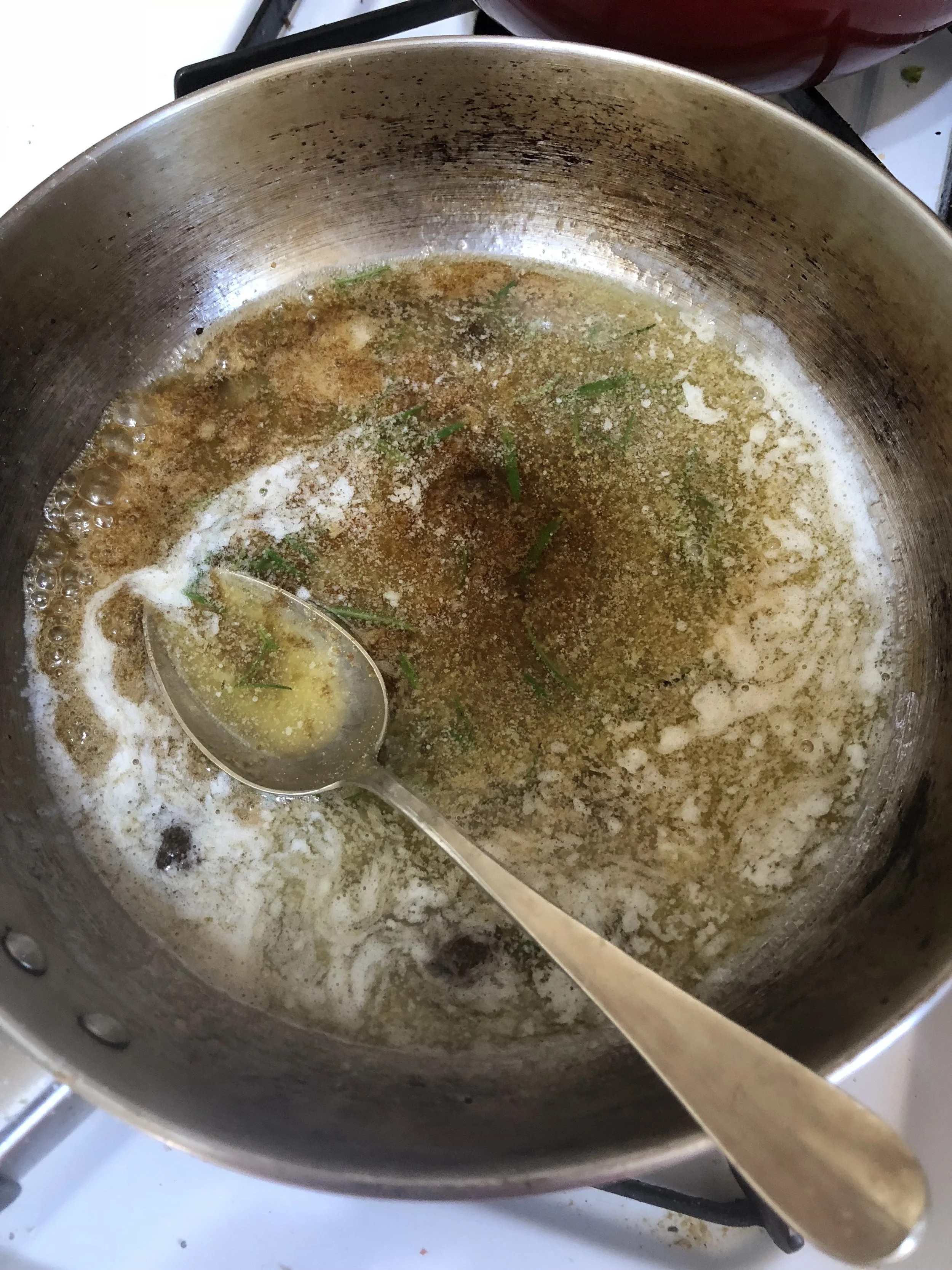 Melt butter over medium heat in medium skillet. When butter is liquid, add honey, brown sugar and rosemary sprig, and then stir frequently. Now you have to watch carefully to get sugar based sauces down pat...but ya got it in ya!