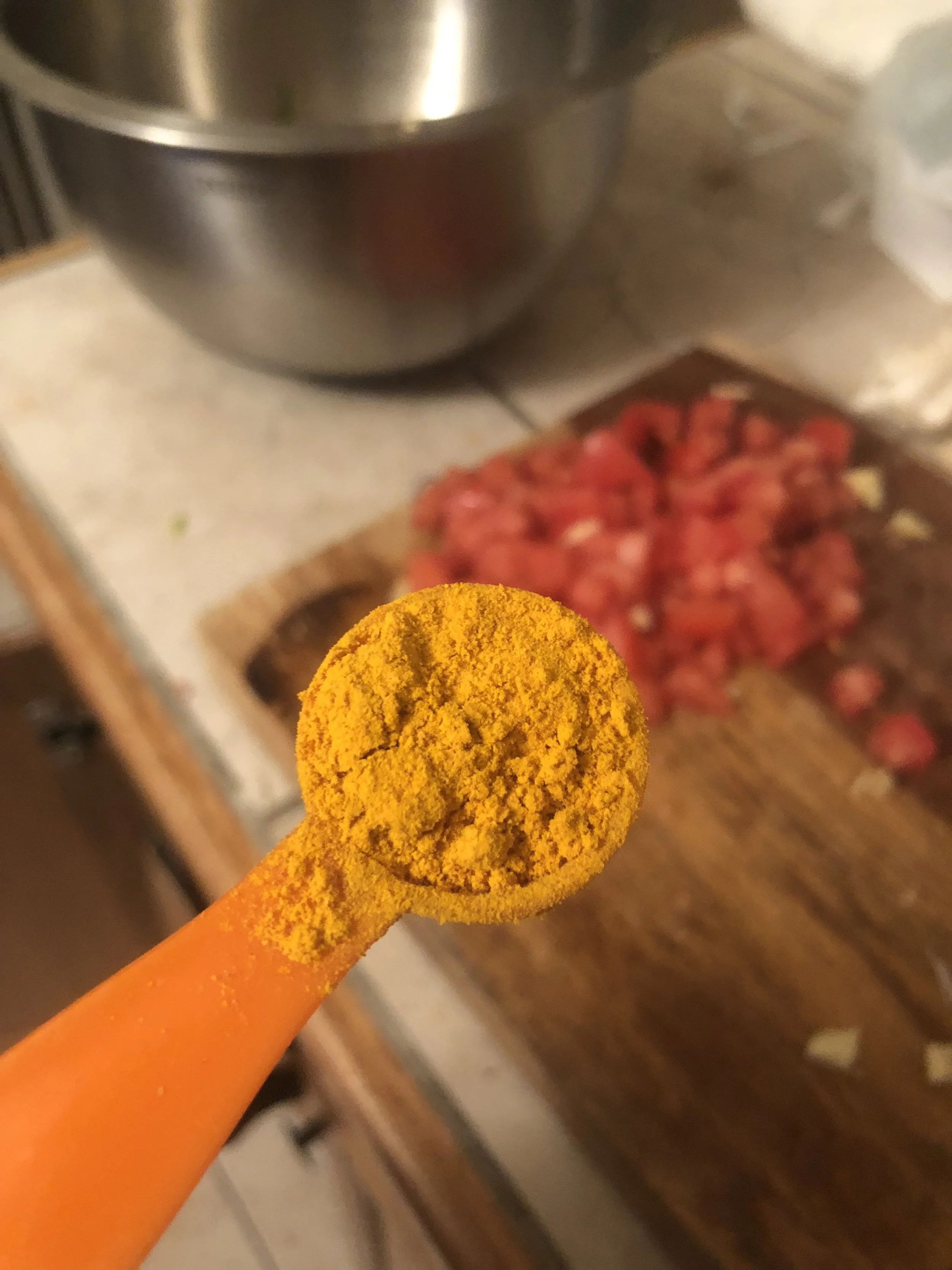 Add garlic, spices, tomatoes.&nbsp;