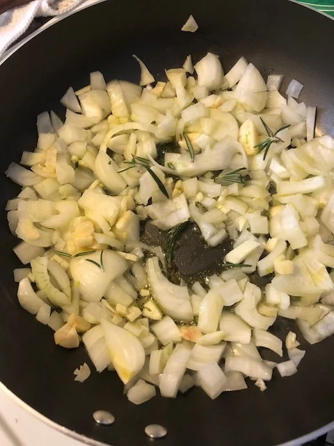 Cook until the onions are clear, being careful not to burn the garlic. *I added rosemary during this step, but you could also add when you add the meat...* 
