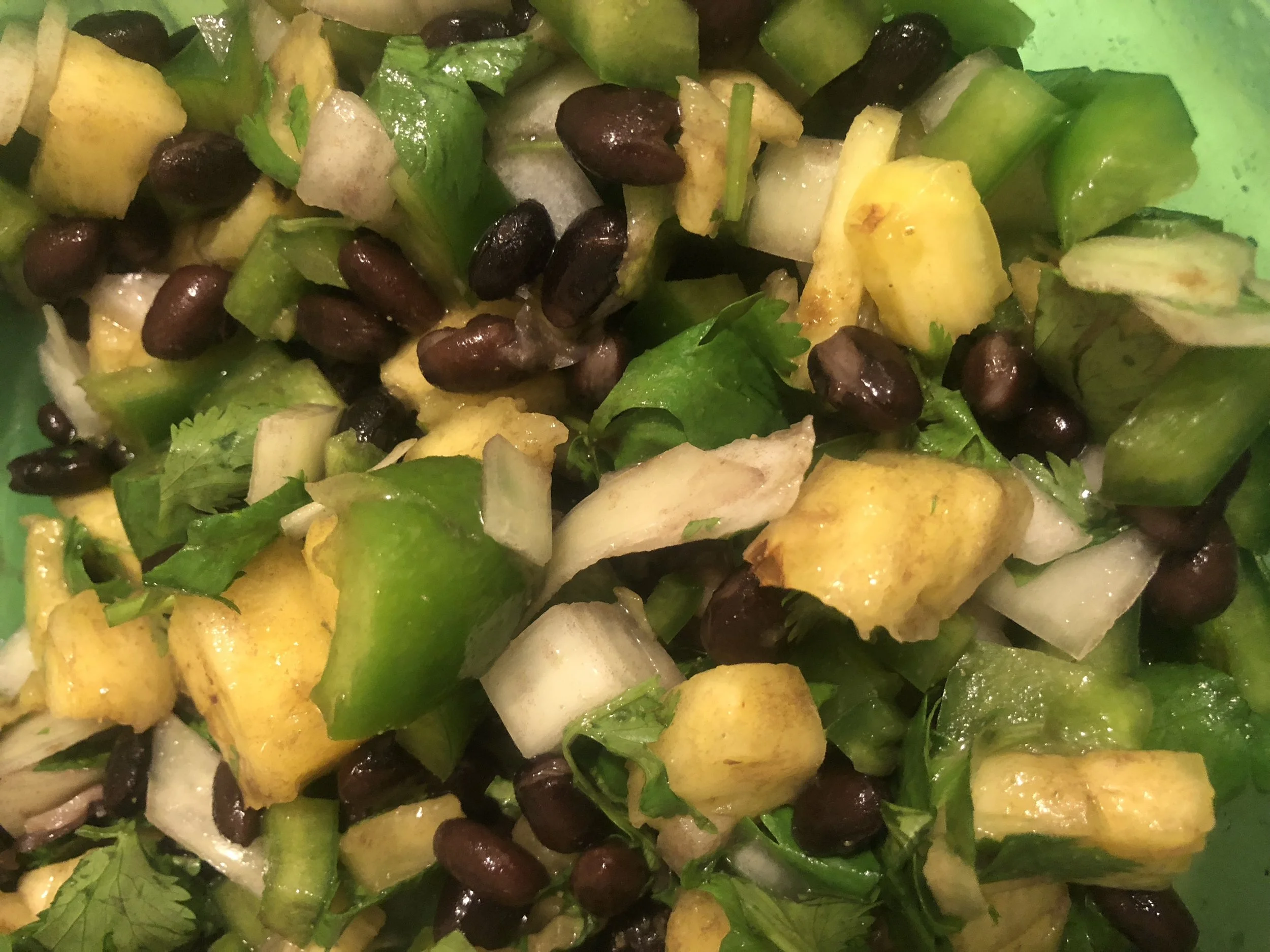 2 cups of pineapplegreen pepper0.5 Spanish Onion8 ounces of canned black beanshandful of cilantro, roughly choppedsalt and pepper (to taste)cuminlimePlan of AttackChop the pineapple to bite sized piecesMix beans (Drained), diced green pepper, diced …