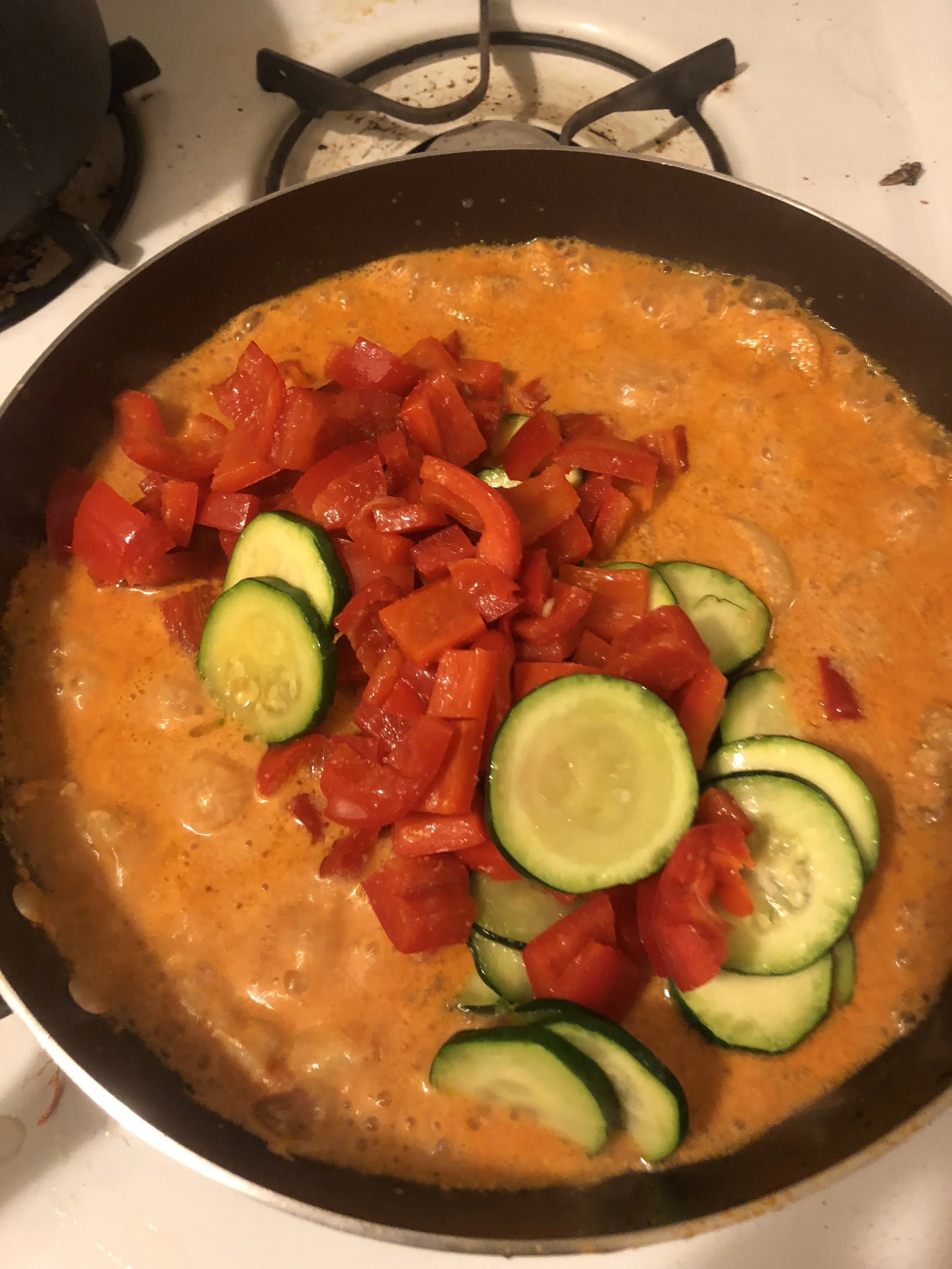 Add the vegetables back in to the pan, and mix throughly. 