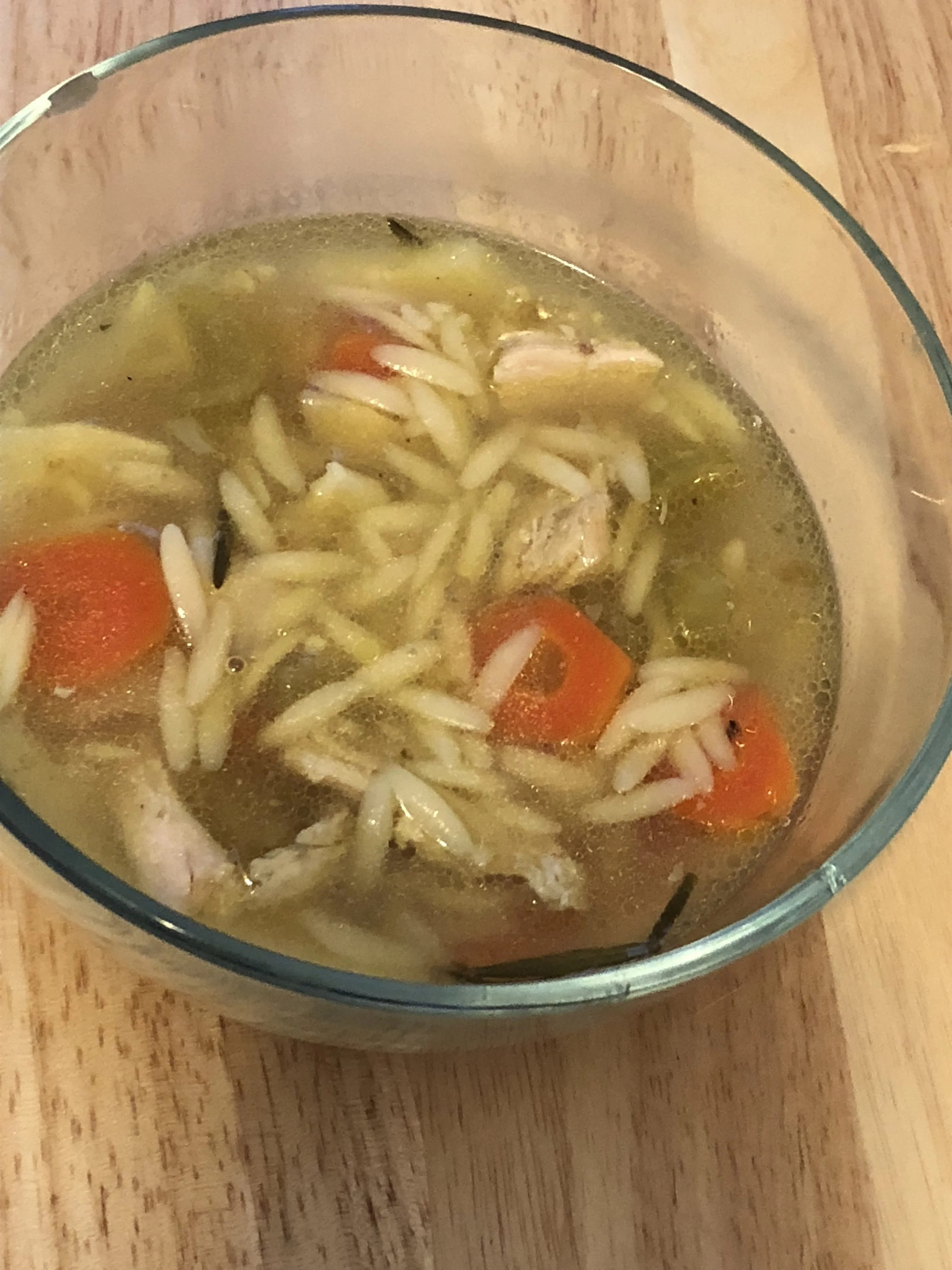 Ingredients Chicken Breast Packet of chicken Goya seasoning Remains of rotisserie chicken (Bones and remaining meat) Rosemary (2 branches) 2 medium carrots 2 medium stalks of celery medium parsnip shallot 2-3 cloves of garlic powdered garlic kosher sea salt ground pepper cup of orzo