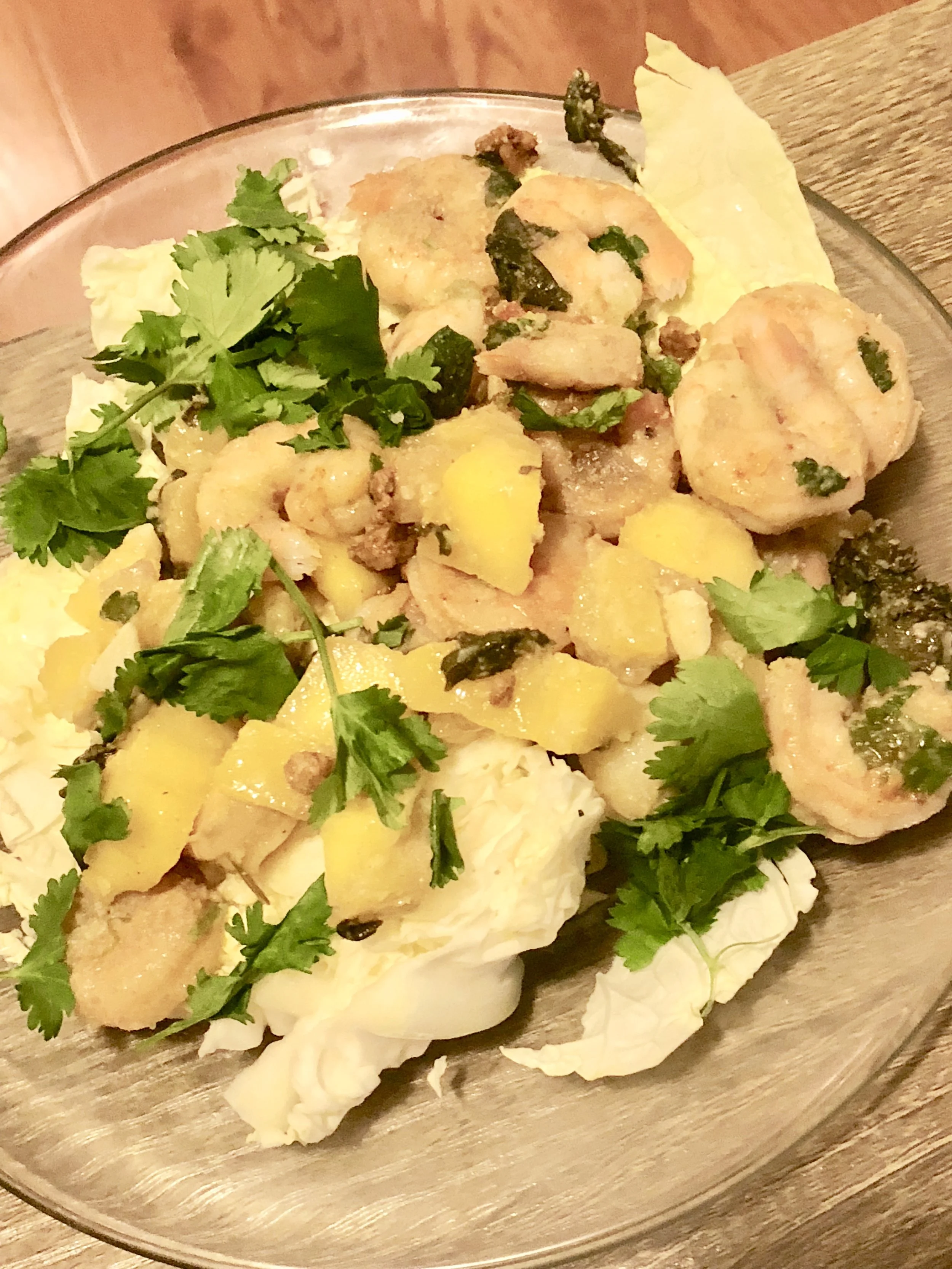 lb of medium-sm shrimp, cleaned, peeled and tail on medium rip mango medium red onion 2-3 cloves of garlic 2-3 pats of butter bunch of cilantro cumin (2 tbs) salt (to taste) pepper (to taste) 8-9 tortillas tomatillo salsa *Optional- Cabbage, to serve as salad instead of tacos (as seen above) Plan of Attack Dice your onions, garlic and mango Add butter, and garlic to your medium skillet. When aromatic, add the cooked, cleaned, deveined shrimp and cumin. Cook until shrimp are cooked and then add mango. cook for another minute or so, and remove from heat. Serve on tacos, with cilantro and lime, with the optional addition of tomatillo salsa (salsa verde). This recipe called for adding jalapeño but my guests are a little careful about eating hot food so I serve jalapeño as an option on the fixin' tray...