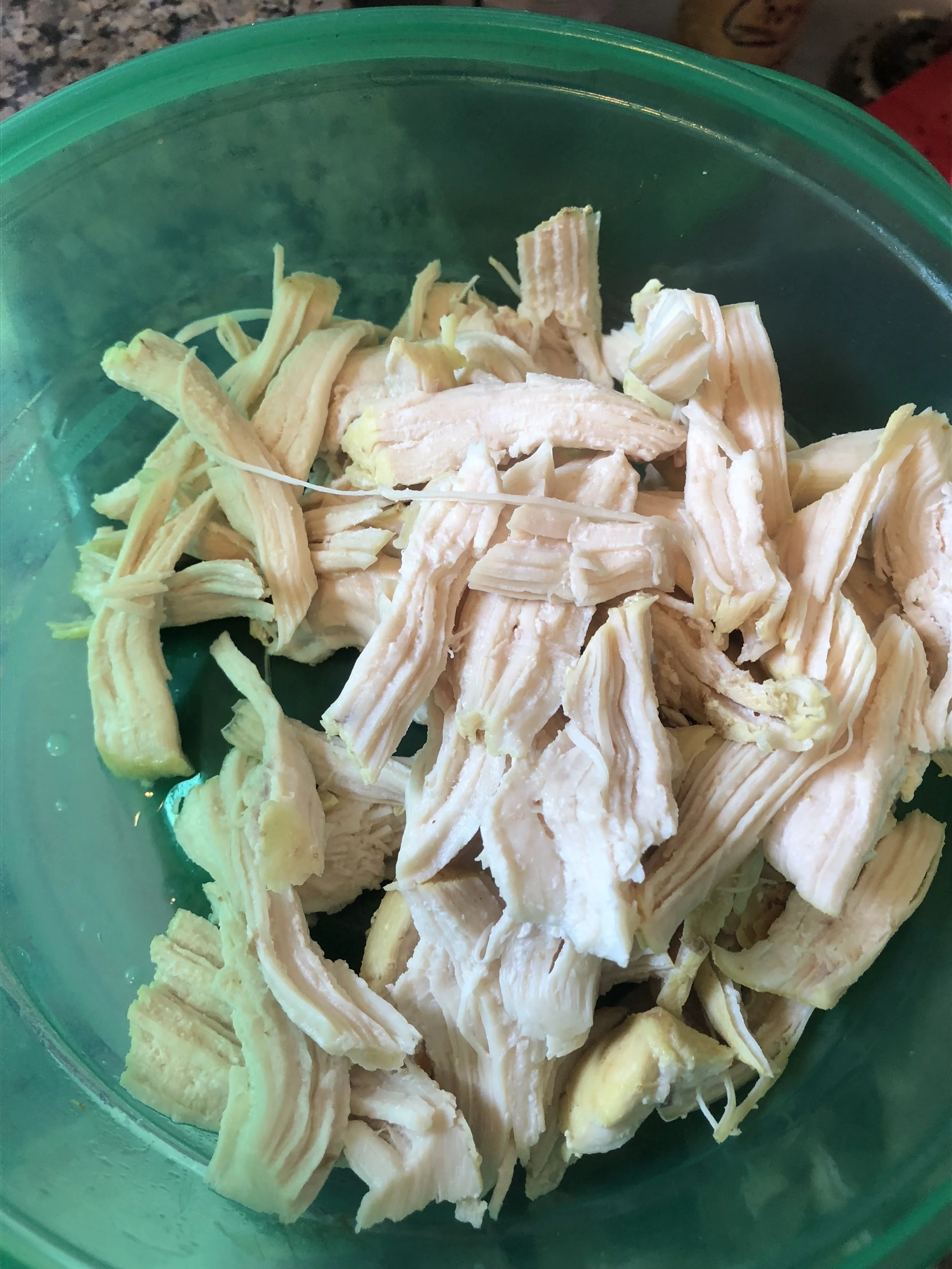 While stock was cooking, poach your chicken breast in Goya chicken bouillon and 2 cups of water. remove from heat, allow to cool and then shred with your fingers.