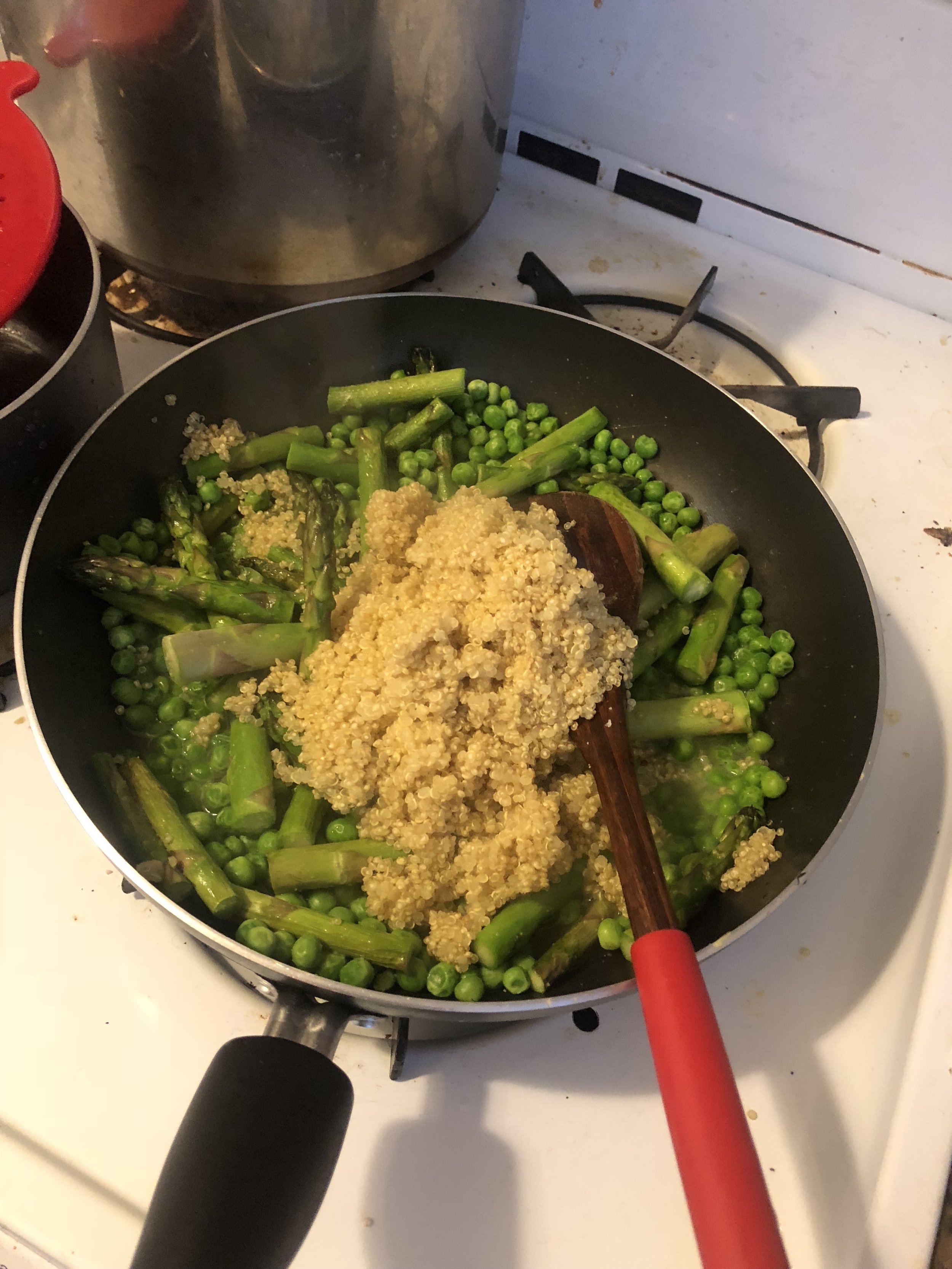 Ingredientscup of Quinoa15 stalks of asparaguspkg of frozen peas2 pats of butterGoya Chicken Seasoning (packet)3 cloves of garlic- diced 