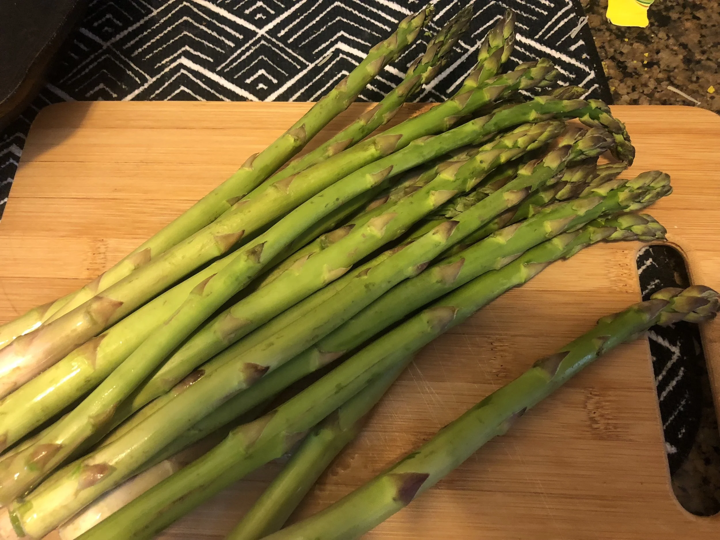 Clean your asparagus into bite sized pieces, removing the ends.