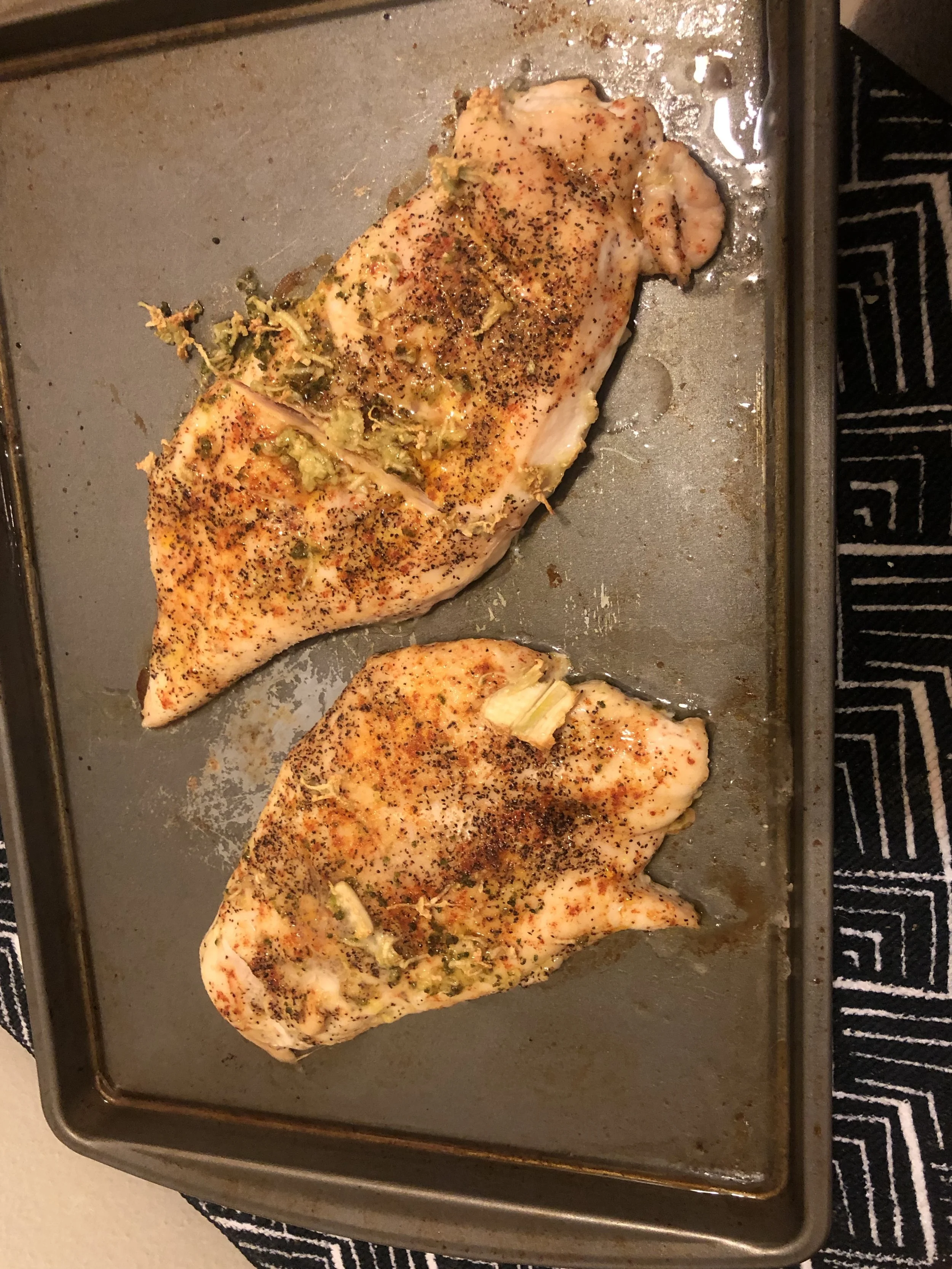 Remove the chicken from the oven (if you're baking) between 23-30 minutes, Coin your cucumbers, and coat them in the sauce. Drizzle the remaining sauce on the chicken breasts. My comments: I made quick skin-on garlic smashed potatoes (super simple, and I'll post the recipe soon) to accompany and on a whim I added some of the sauce to the potatoes! Match made in cilantro heaven! I would make this sauce in the future, simply to add to potatoes! I would, if making again, add more lemon juice, up the Thai chili sauce, and cut down on the jalapeño...I might also add a little diced shallots and refrigerate the sauce for more moments in the fridge before using.