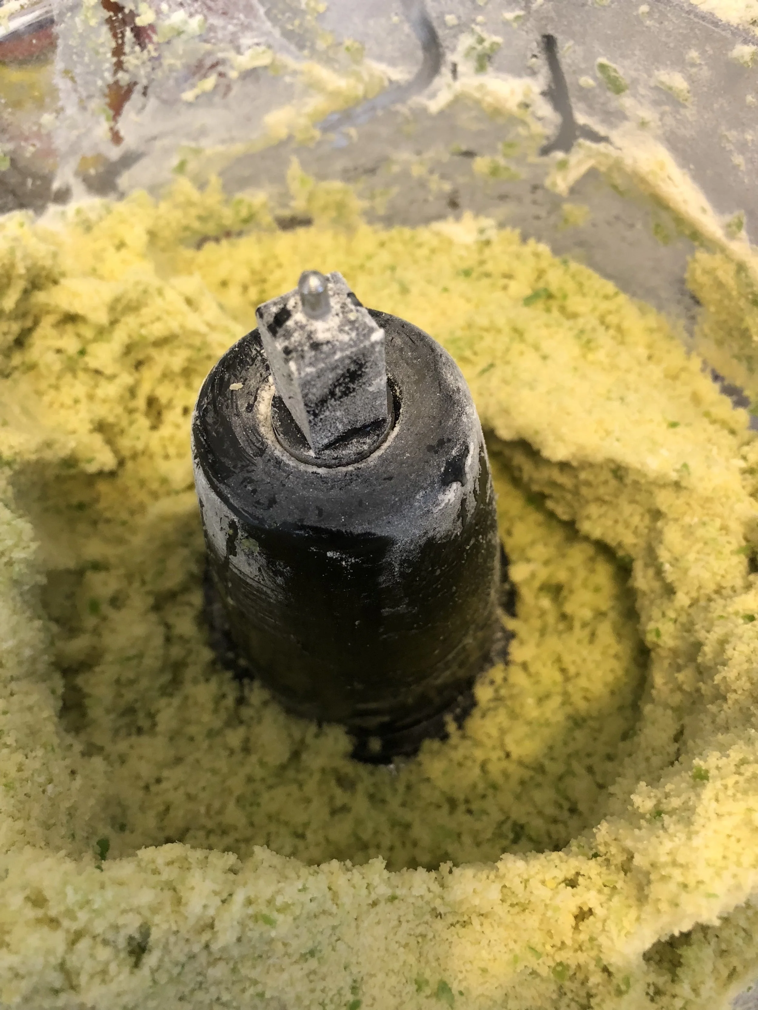 Add the flour, salt, pepper, and eggs into the food processor and mix until the ingredients are thoroughly integrated.&nbsp;Add the garlic scape puree and mix throughly