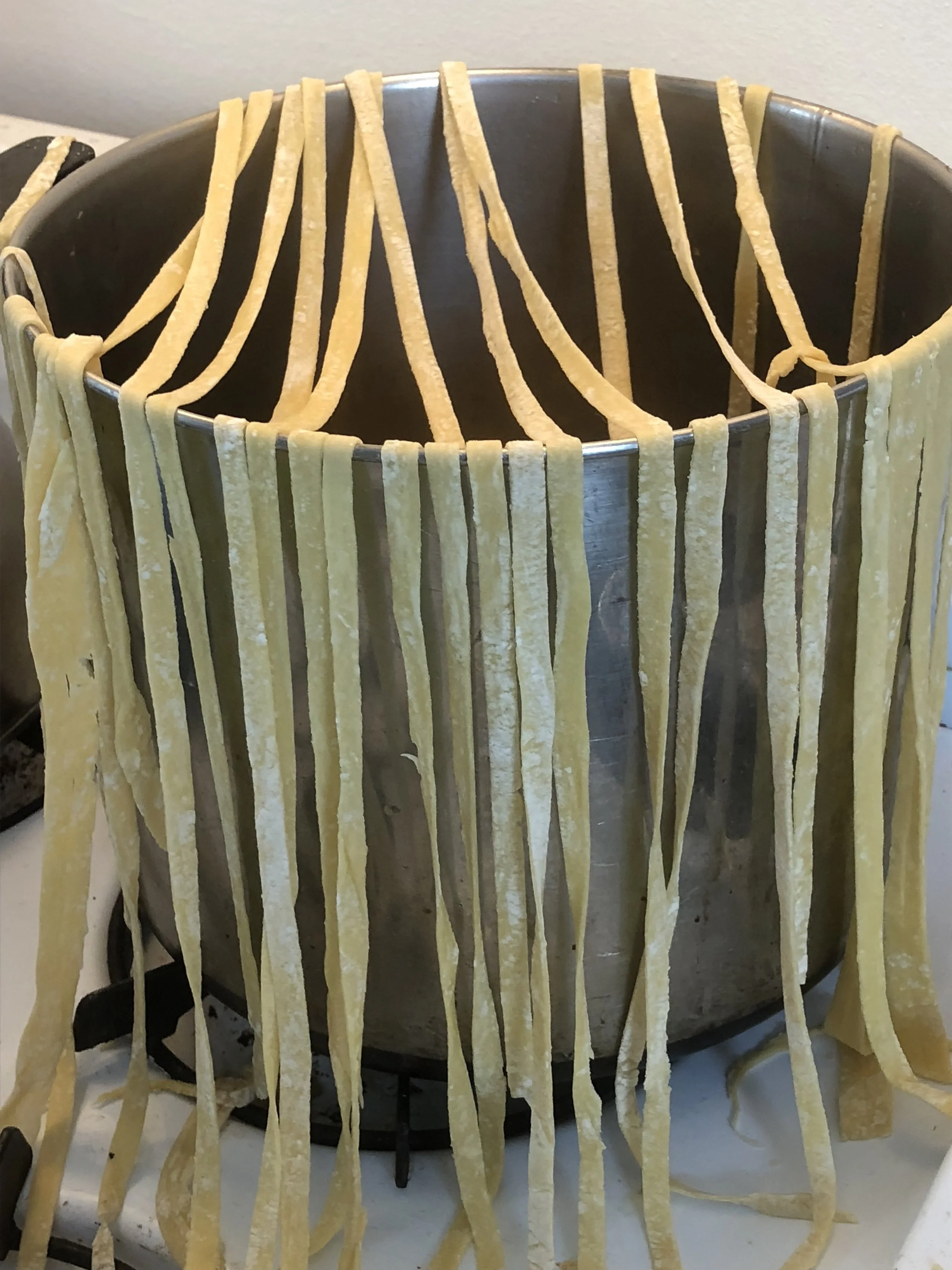 Drape the pasta over your pasta rack..or your biggest stockpot if you're like this lady and don't have a pasta rack