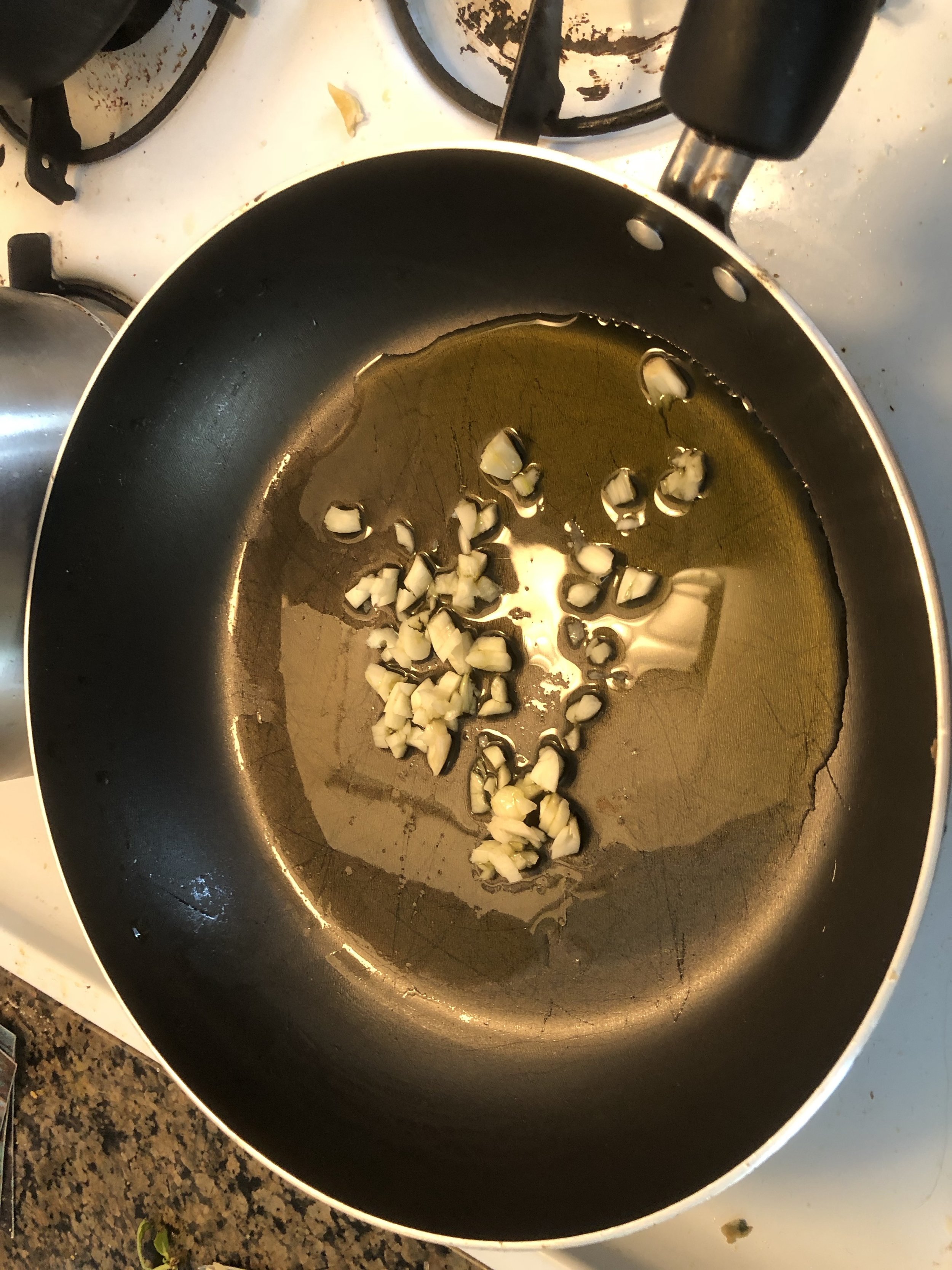 Add the garlic on medium low heat and cook until aromatic.