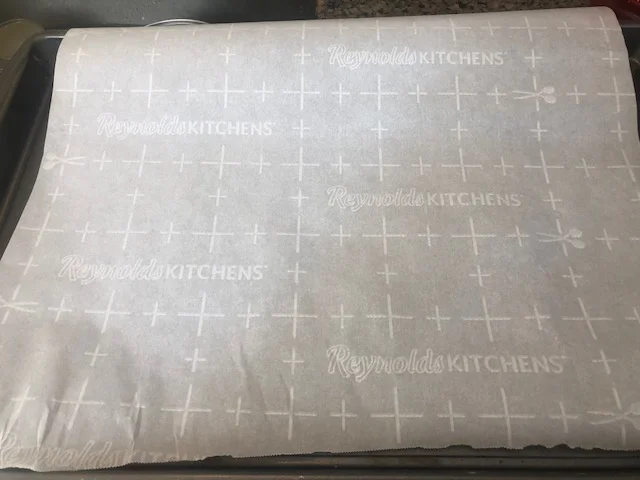 cover your sheet pan in parchment paper