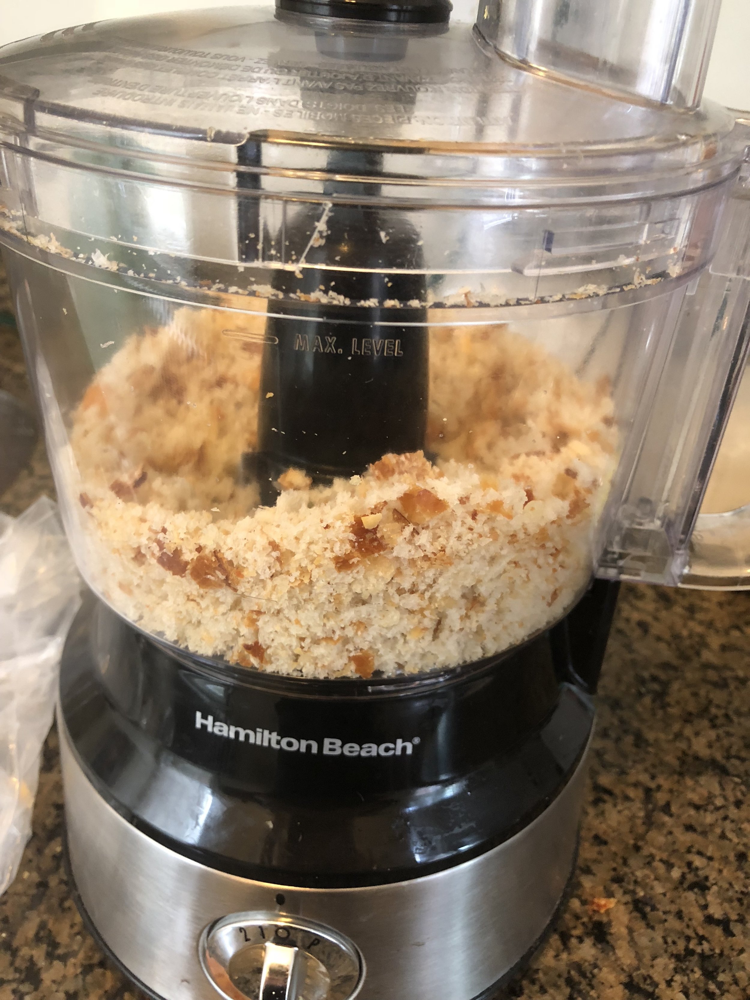 ut the Asiago bread into your food processor and process until the consistency of bread crumbs