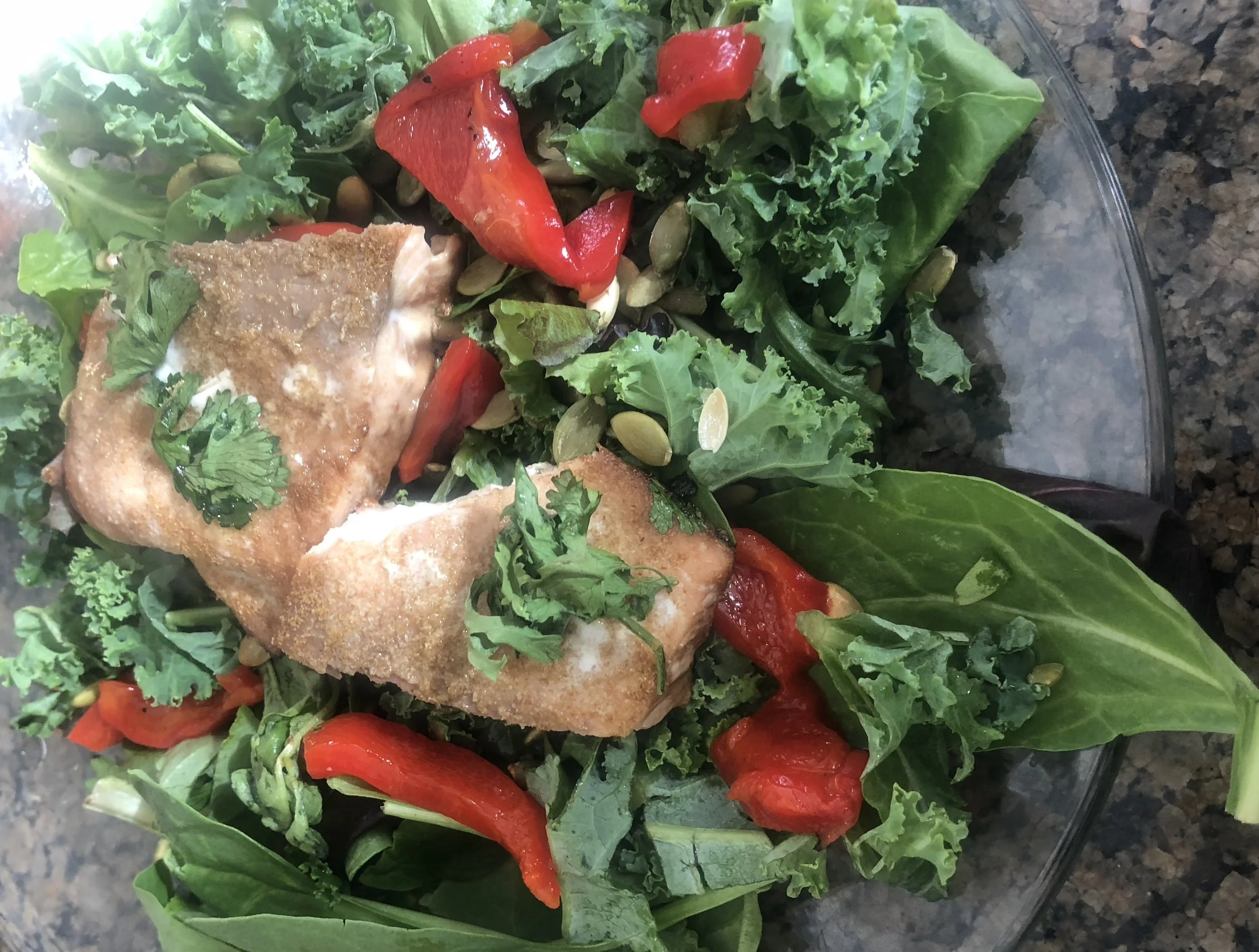 Ingredientsmedium portion size salmontbls of cumintsp of olive oiltsp of powdered garlictsp of ground peppertsp of sea salttsp of diced cilantroSalad2 cups of kale (roughly chopped)roasted red bell pepper3 tsp of salted pepitasgorgonzola cheese crum…