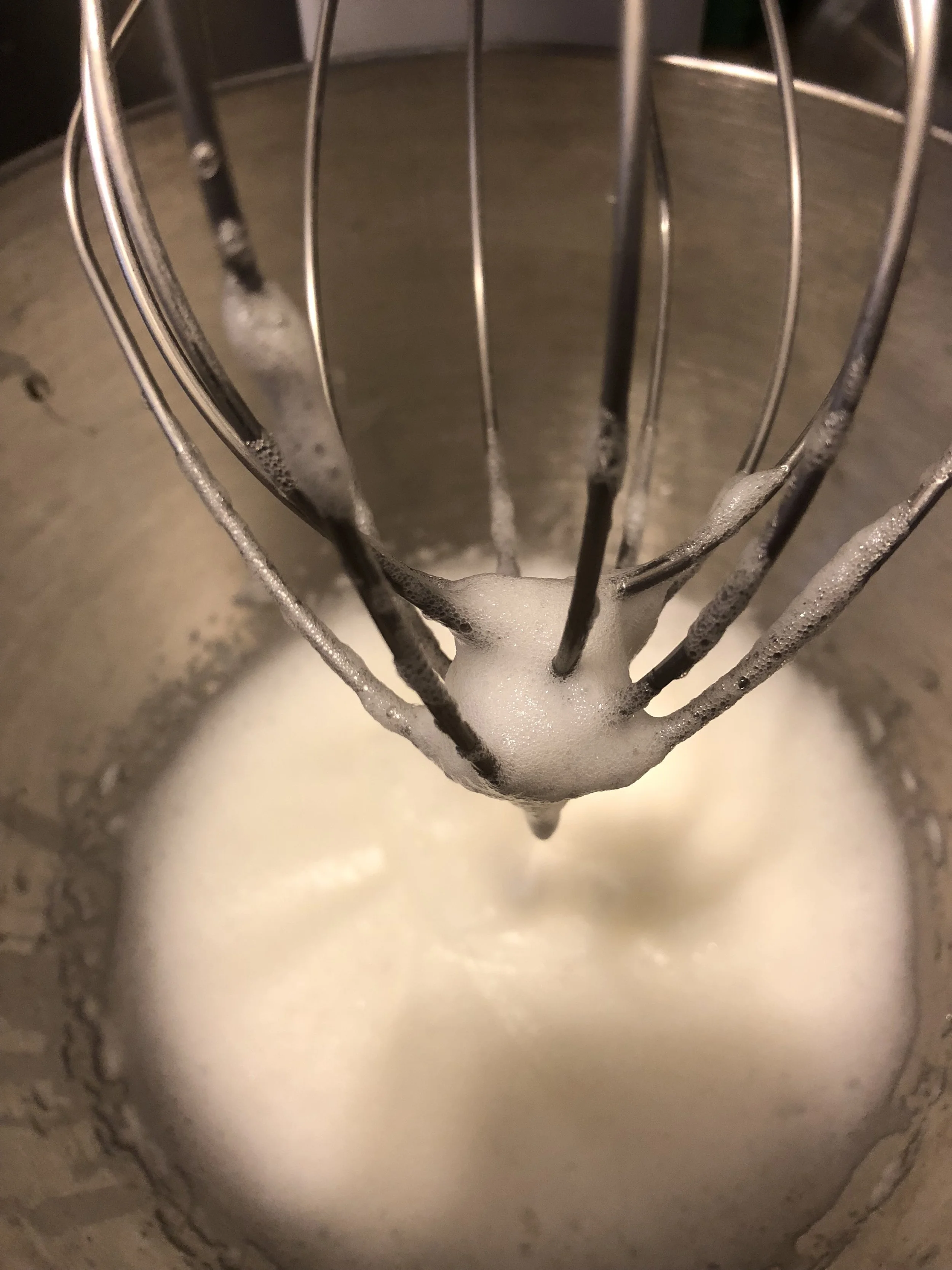 Fold the eg whites into the coconut mixture. Mix the ingredients throughly and then place even handed spoon sized amounts on parchment covered baking sheets and cook for 20-25 minutes, checking regularly.My oven runs hot and I overcooked 6 of my coo…