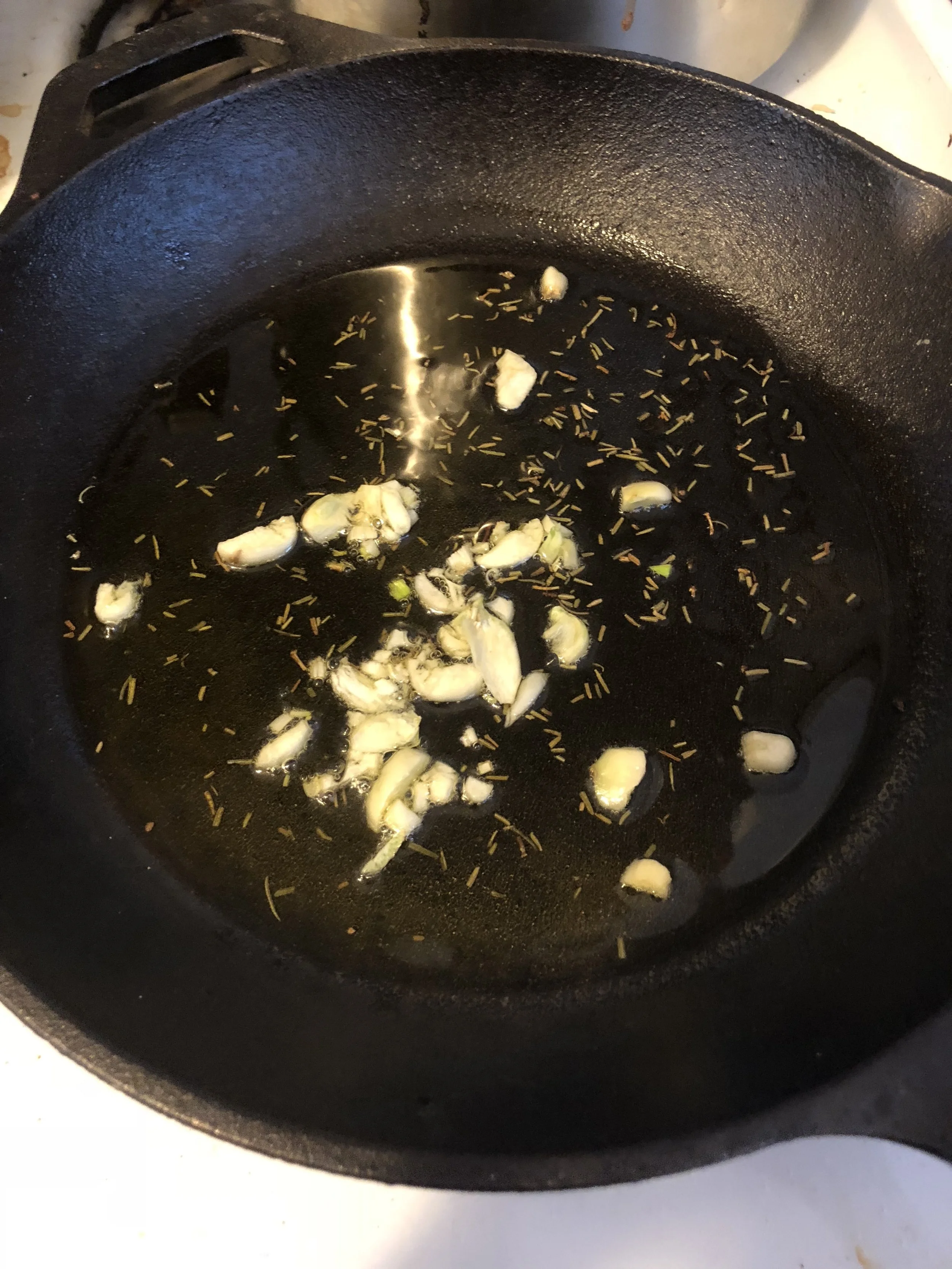 Add the olive oil and garlic to your medium skillet