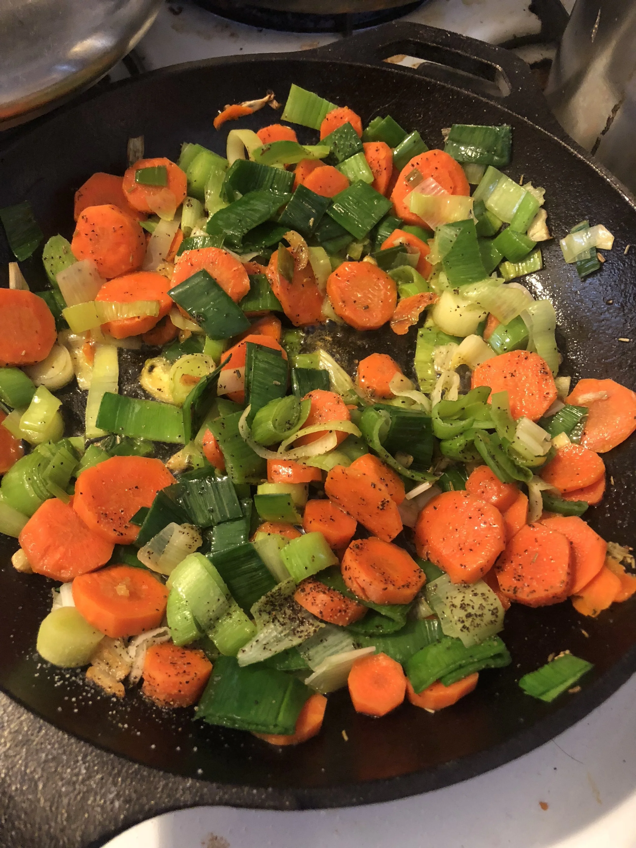 Add the carrots and leeks to the hot skillet- I also added a tbls of butter the second time I made this recipe, and I used Rosemary infused olive pil instead of traditional olive oil.