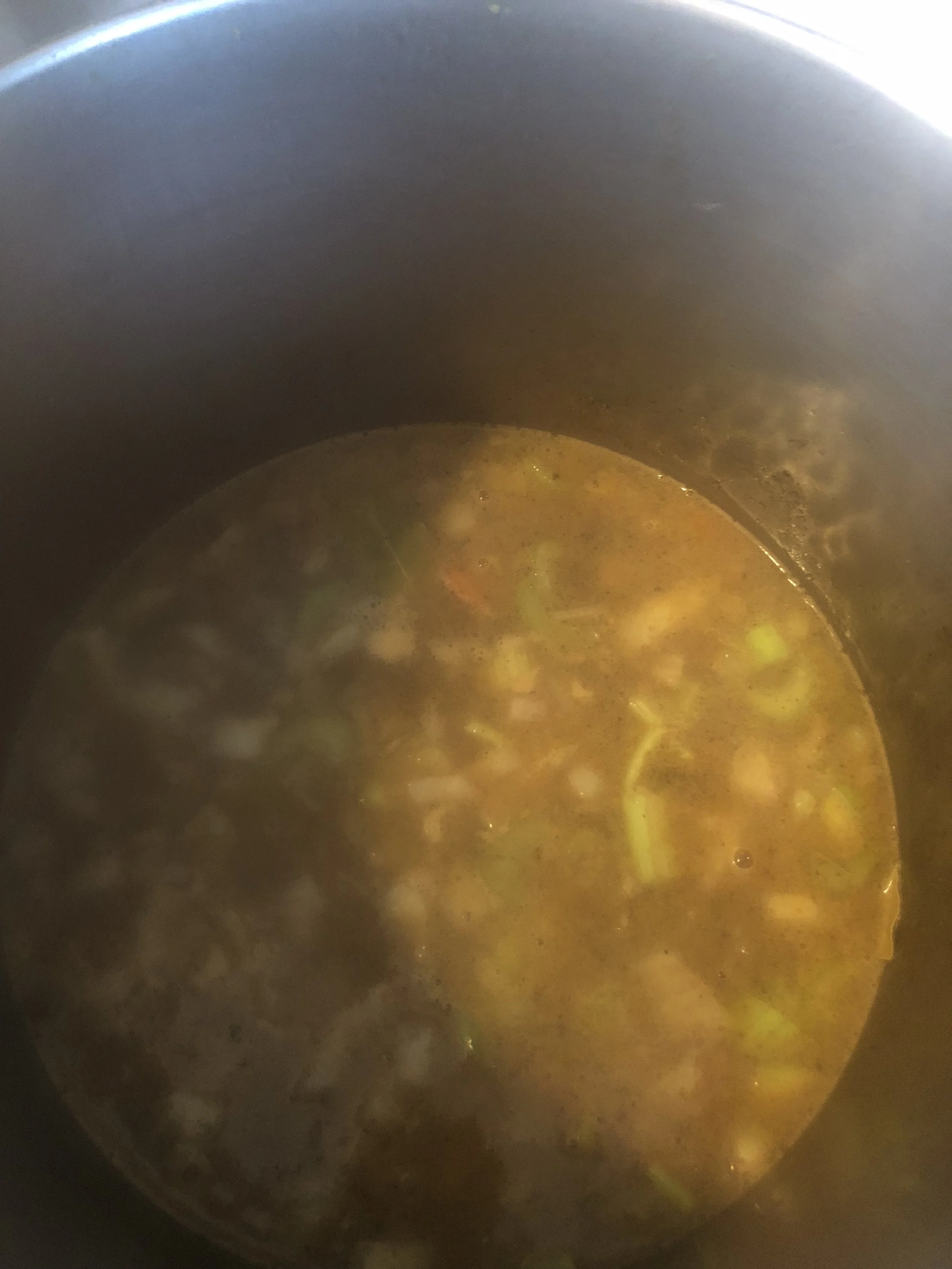 Add the beef broth and cook thoroughly. Add the beef back in and then add the bay leaves. Cook until beef is very tender.