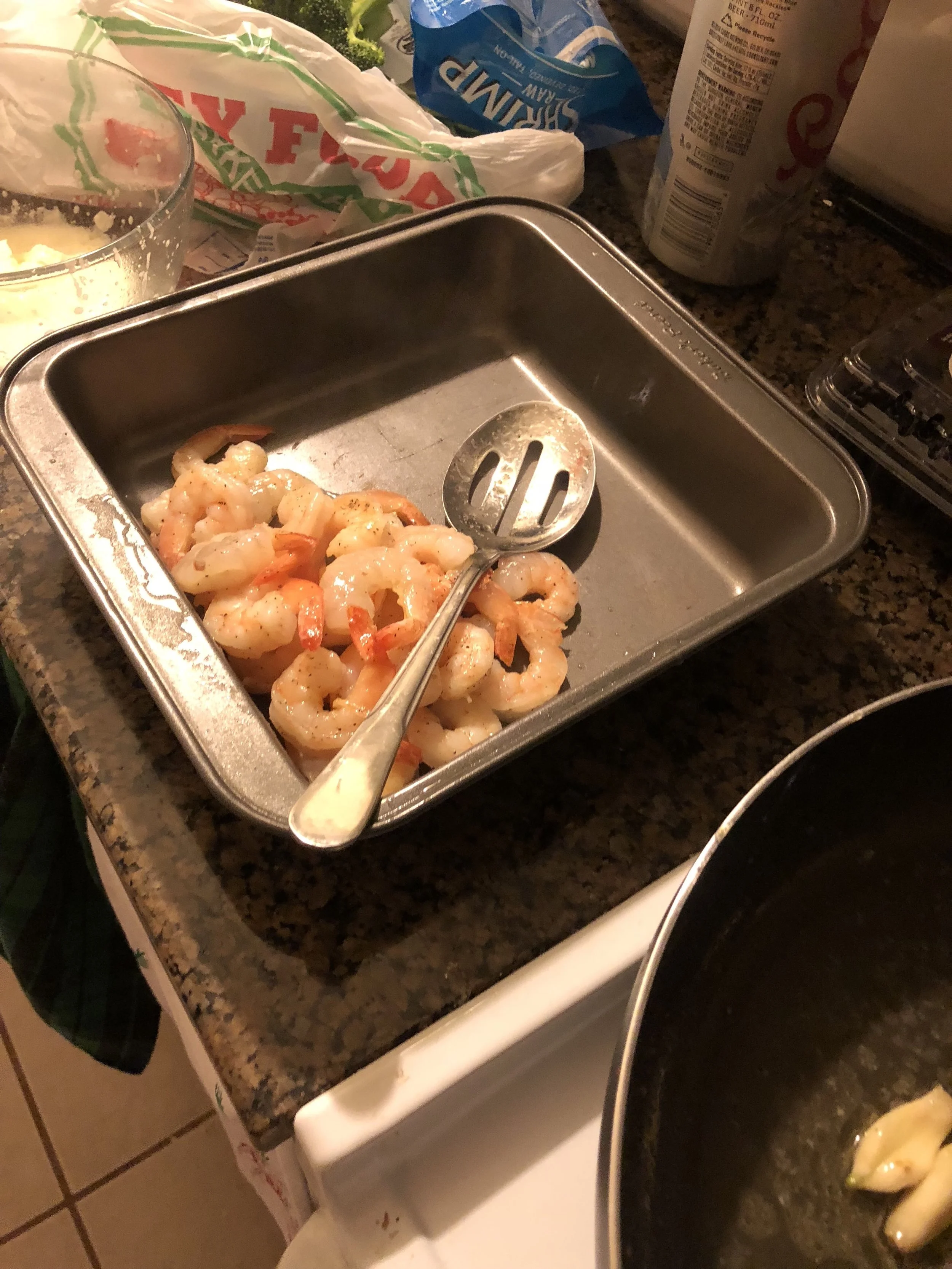 Put the shrimp aside and in the drippings, add the flour.