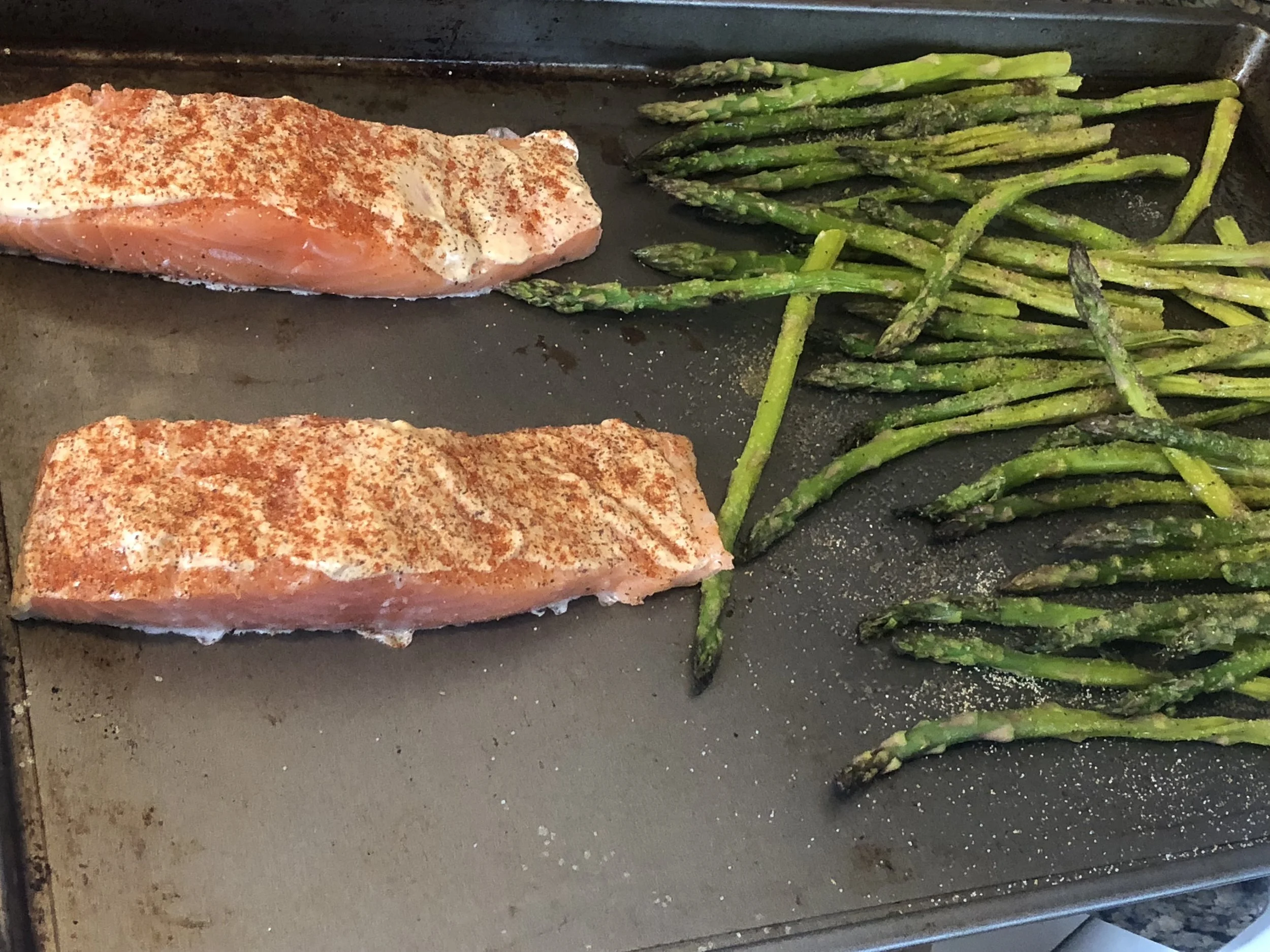 when your kitchen timer has expired, put your salmon onto the pan with the asparagus, skin side down. Cook for 15-20 minutes or until the salmon is cooked through.My Comments: This recipe included coating the salmon with Panko and I will try this in…