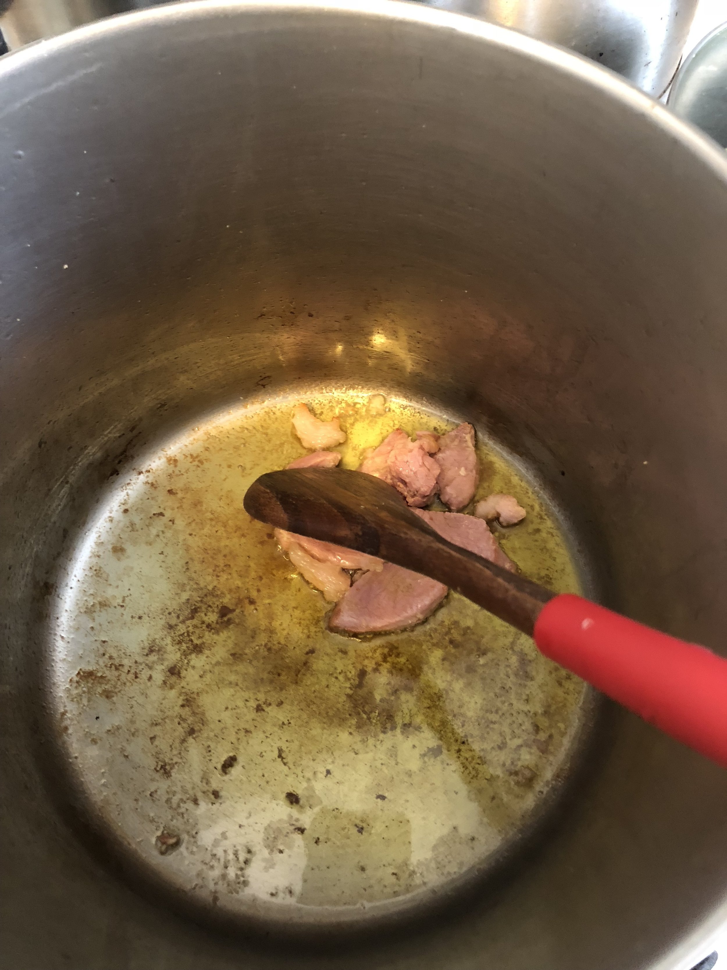 Cook the salt pork until cooked through and juices have rendered. Remove the salt pork and discard.