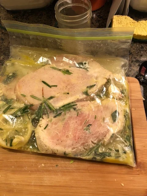 Clean your chicken breasts, and put all the ingredients in your gallon ziplock bag and wrap so the chicken is completely covered in the marinade