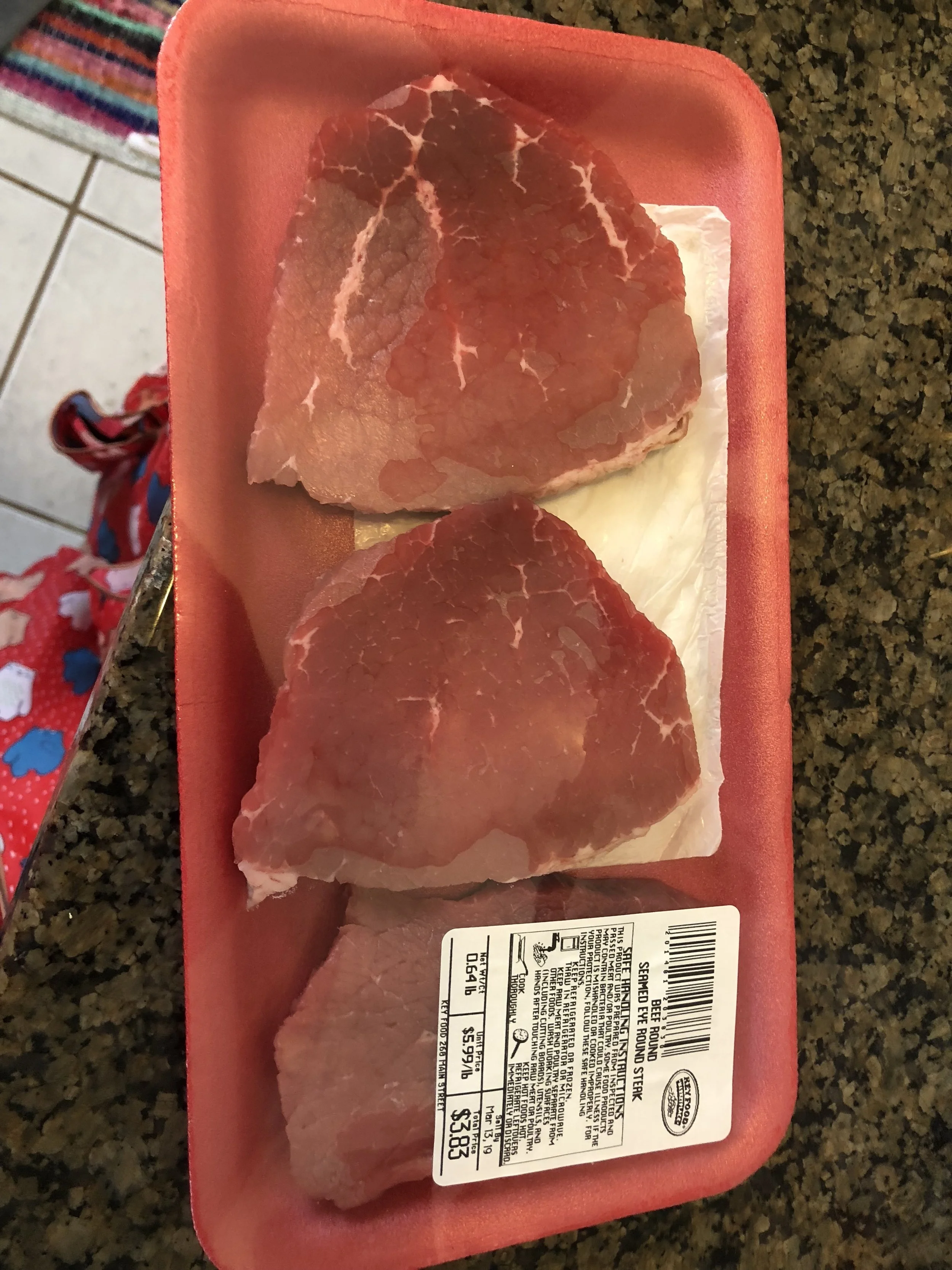 Slice your beef into strips, salt and pepper and marinate in 0.33 cup of soy sauce for an hour. Add 2 tbs of olive oil into your medium skillet and when got add the garlic. Add the beef and cook until medium well.