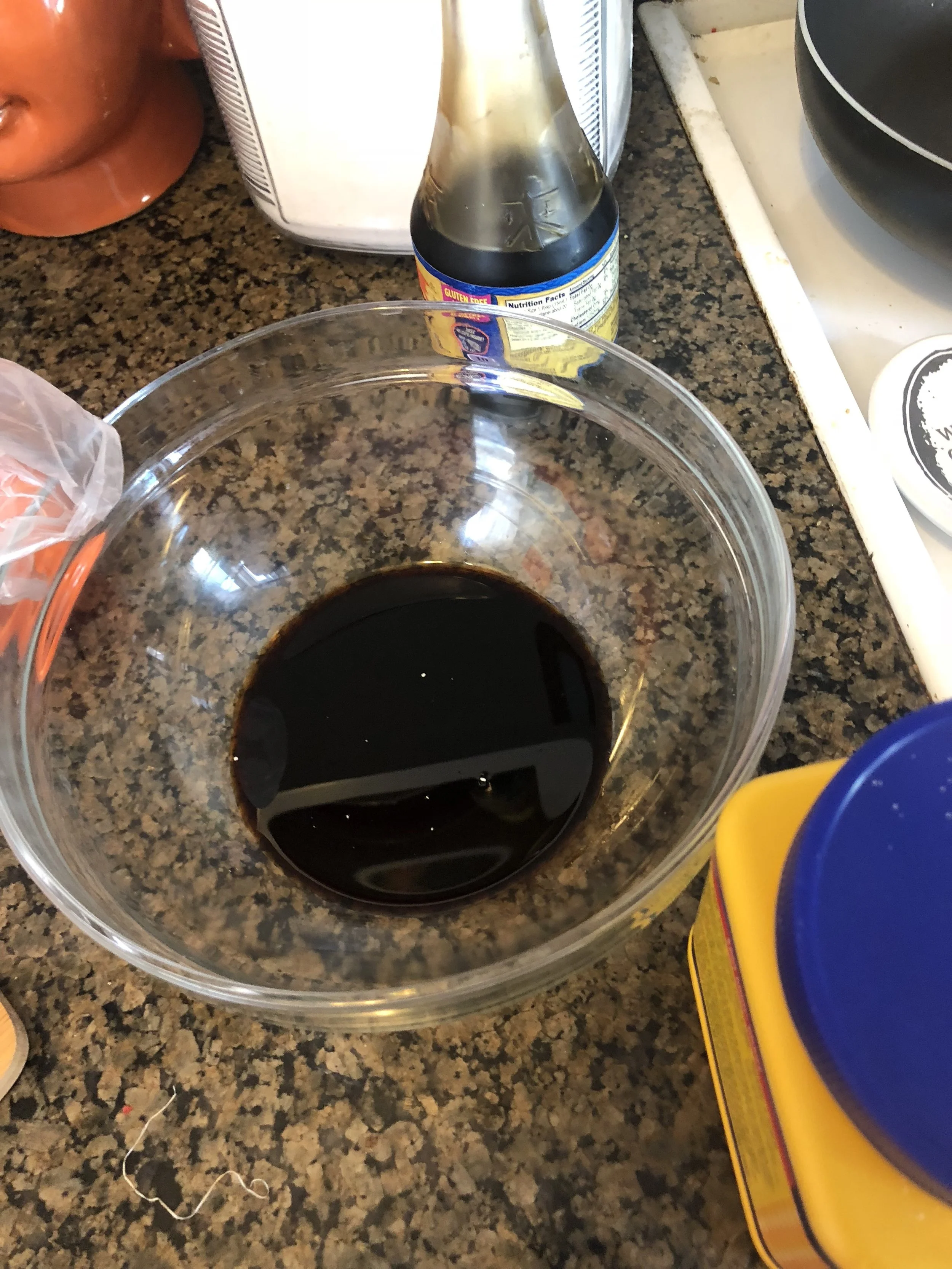 Mix third of a cup of soy sauce, chicken stock, powdered garlic, brown sugar and whisk together