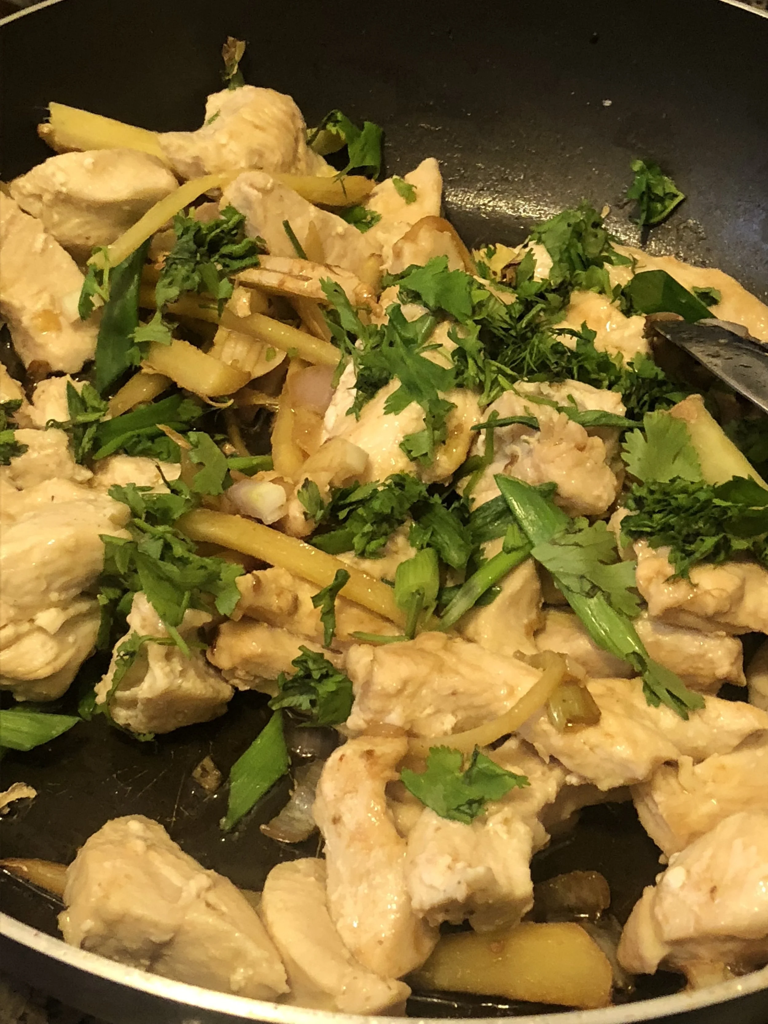 Chop the cilantro and add it onto the the finished stir fry. Serve hot and with the accompaniment of roasted or raw vegetables.