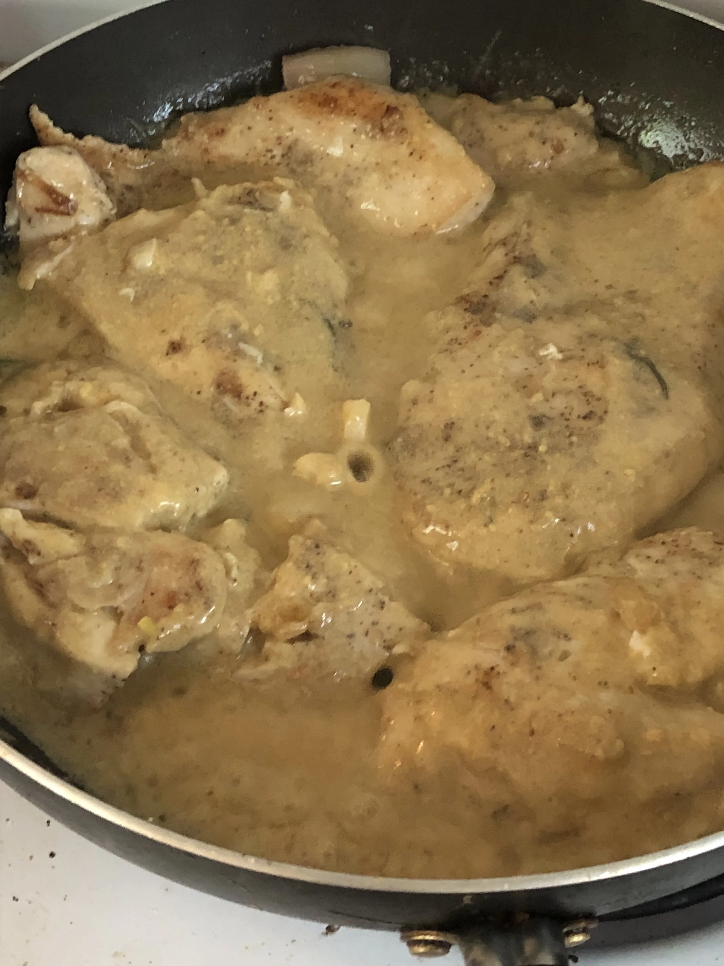 Ingredients 2-3 medium chicken breasts medium shallot 3 garlic cloves sprig of rosemary 2 tbls of flour with extra for dusting 0.5 cup of water 3 tbls of vegetable oil (you could also use olive oil) 2 tbls of dijon mustard tbls of brown mustard (I added extra) an abundance of ground pepper Plan of Attack Cut the chicken into 5-6 pieces and pound with your meat tenderizer until they’re about the same thickness. Season the chicken on both sides with salt and pepper. Pour about a tbls of oil into your medium skillet and when hot, add the chicken. Dice your shallots and garlic Brown the chicken on both sides, and then sprinkle each side with flour and return to pan to develop a rich texture on the outside of the breasts Add the shallots and garlic into the pan with the chicken breasts and remove the chicken breasts after cooking with the shallots for 2-3 minutes. Put the chicken breasts to the side, add the flour and water to make a simple rue. Then add the remaining oil and mustards to the pan, making sure to stir the sauce with your spoon to prevent the flour from sticking. When the sauce has integrated, add your chicken pieces back in the pan with the sauce and cook on medium low heat for 9-11 minutes, Season with more ground pepper and serve covered generously with the sauce.