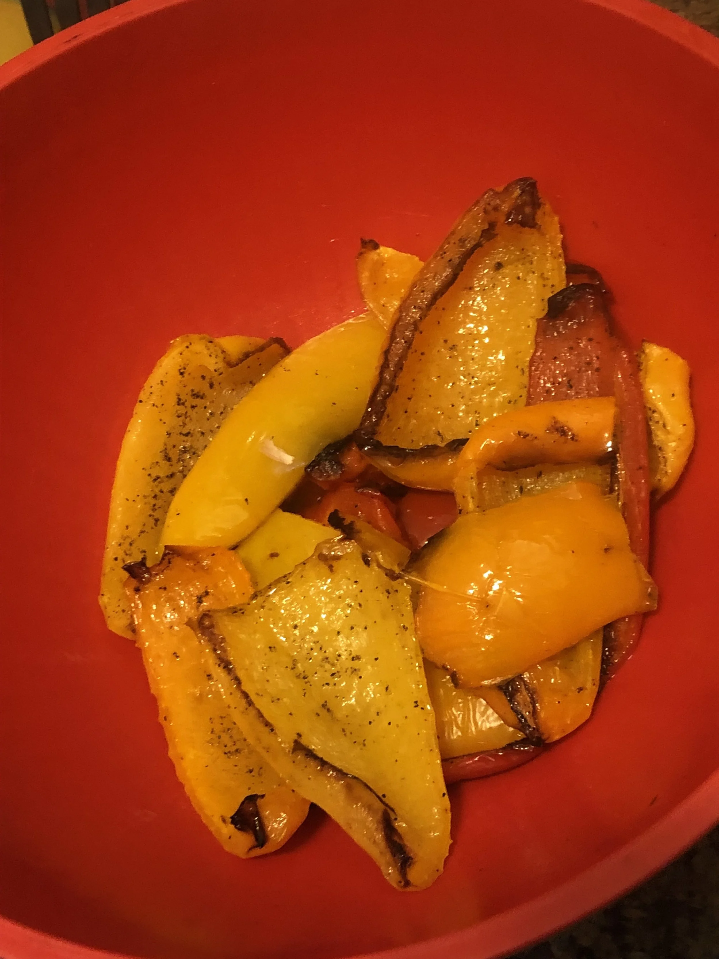 Uncover bell peppers and peel away charred skin from flesh (don’t worry about getting every last bit); discard.