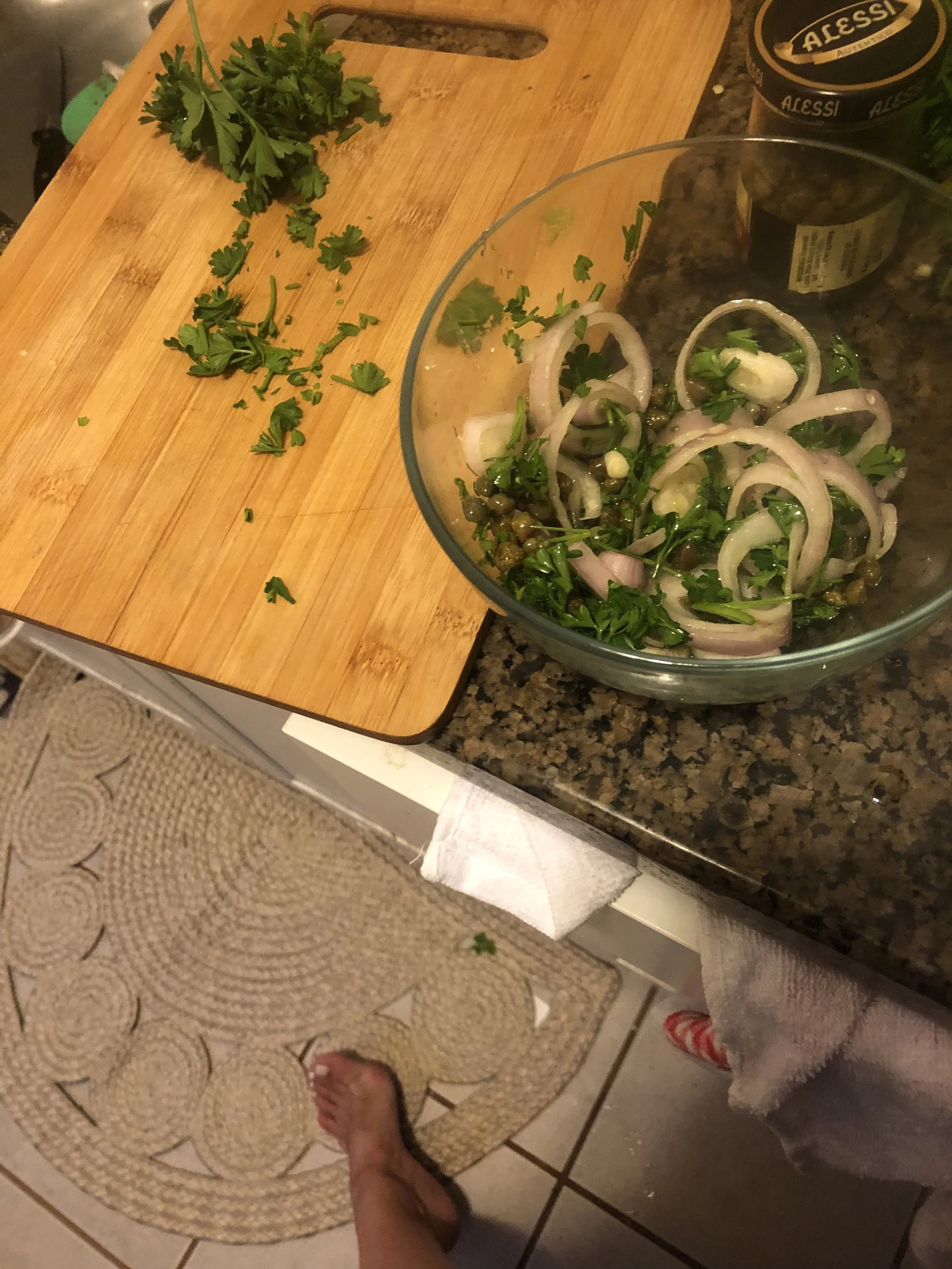 Meanwhile, toss onion, parsley, capers, and remaining 1 Tbsp. oil in a small bowl; season with salt.