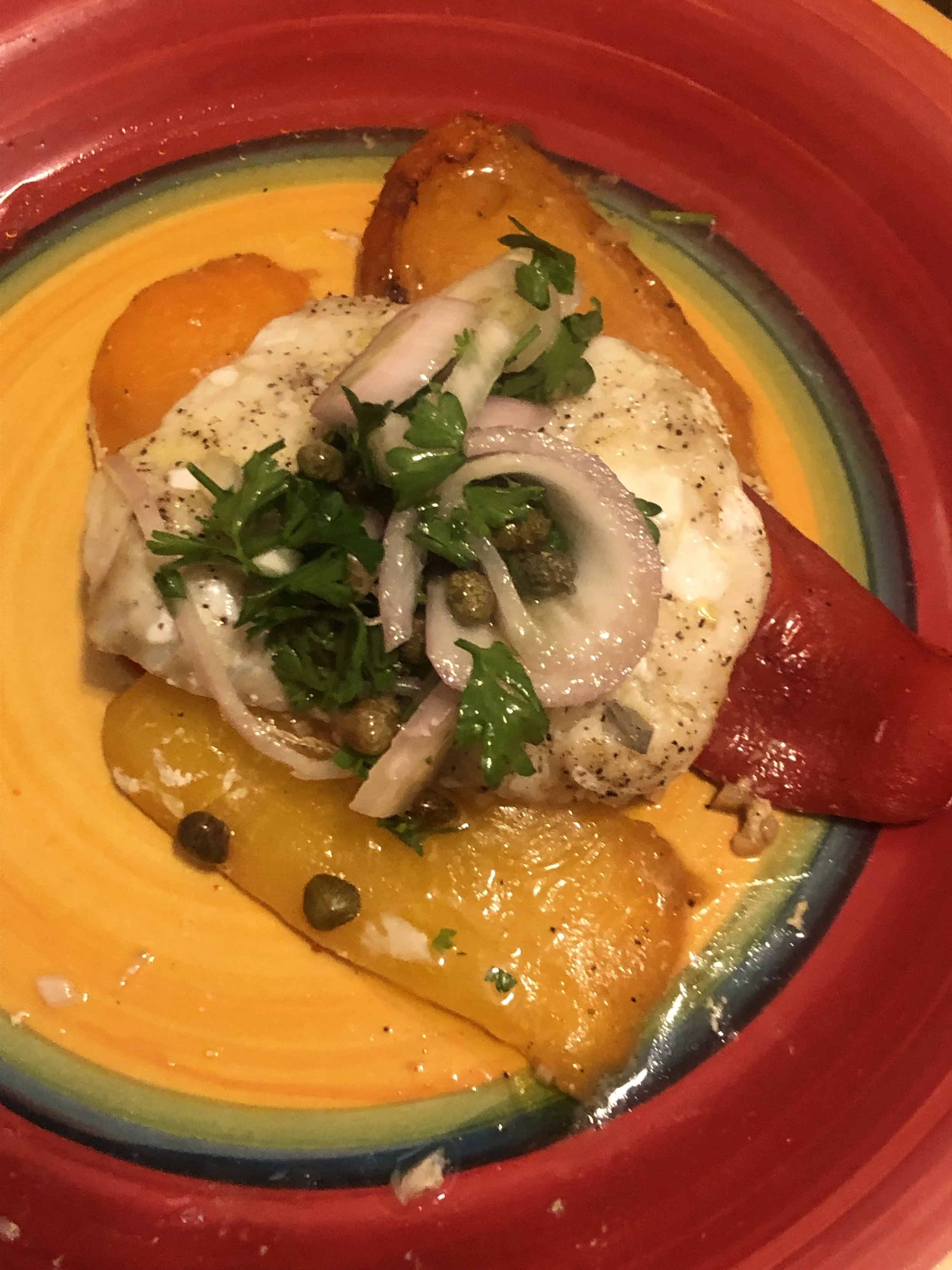 Top fish with onion mixture and serve with bread.