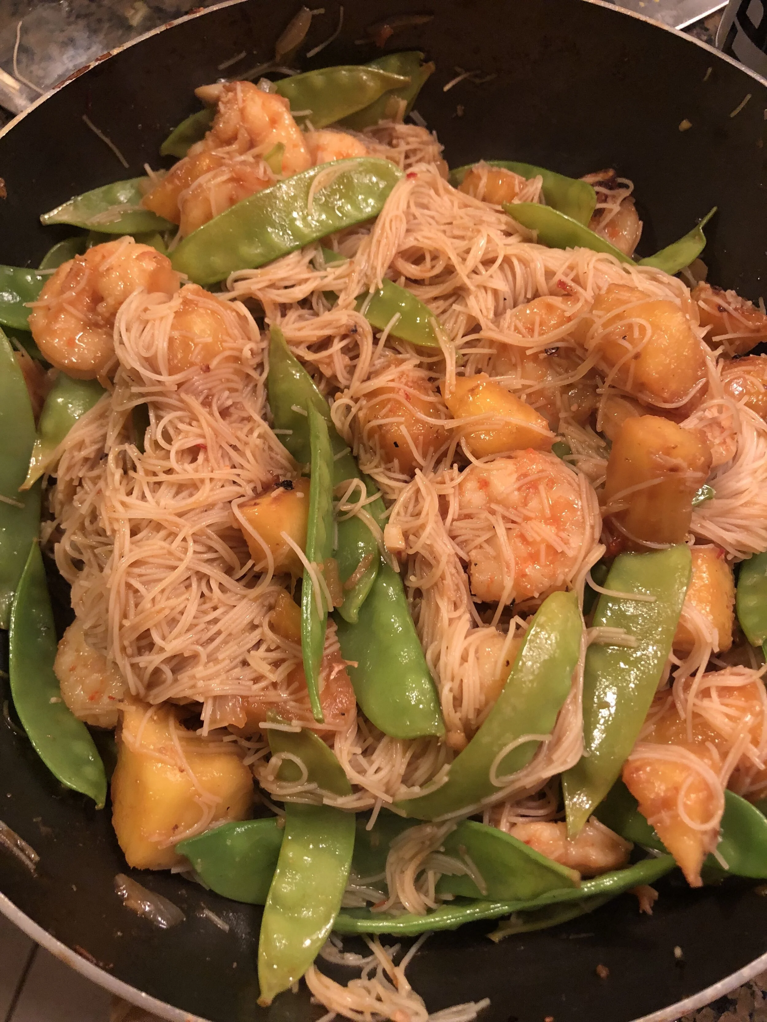 Add the shrimp an pineapple back into the pan and stir to coat in the juice mixture. Simmer and add noodles to the skillet. *Optional- add sugar snap or snow peas to the mixture and let them cook in the same juices.Serve hot garnished with raw onion…