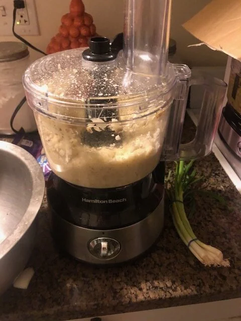 Process the potatoes and onions until a smooth paste