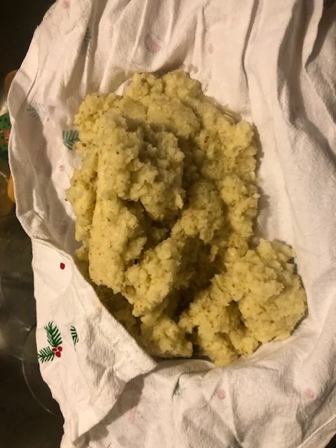 Put the potato onion mixture in a cheesecloth / dish towel and drain the liquid from the potatoes. *Some recipes say to reserve some of the potato starch water, but I did not because I did not have a real cheesecloth.