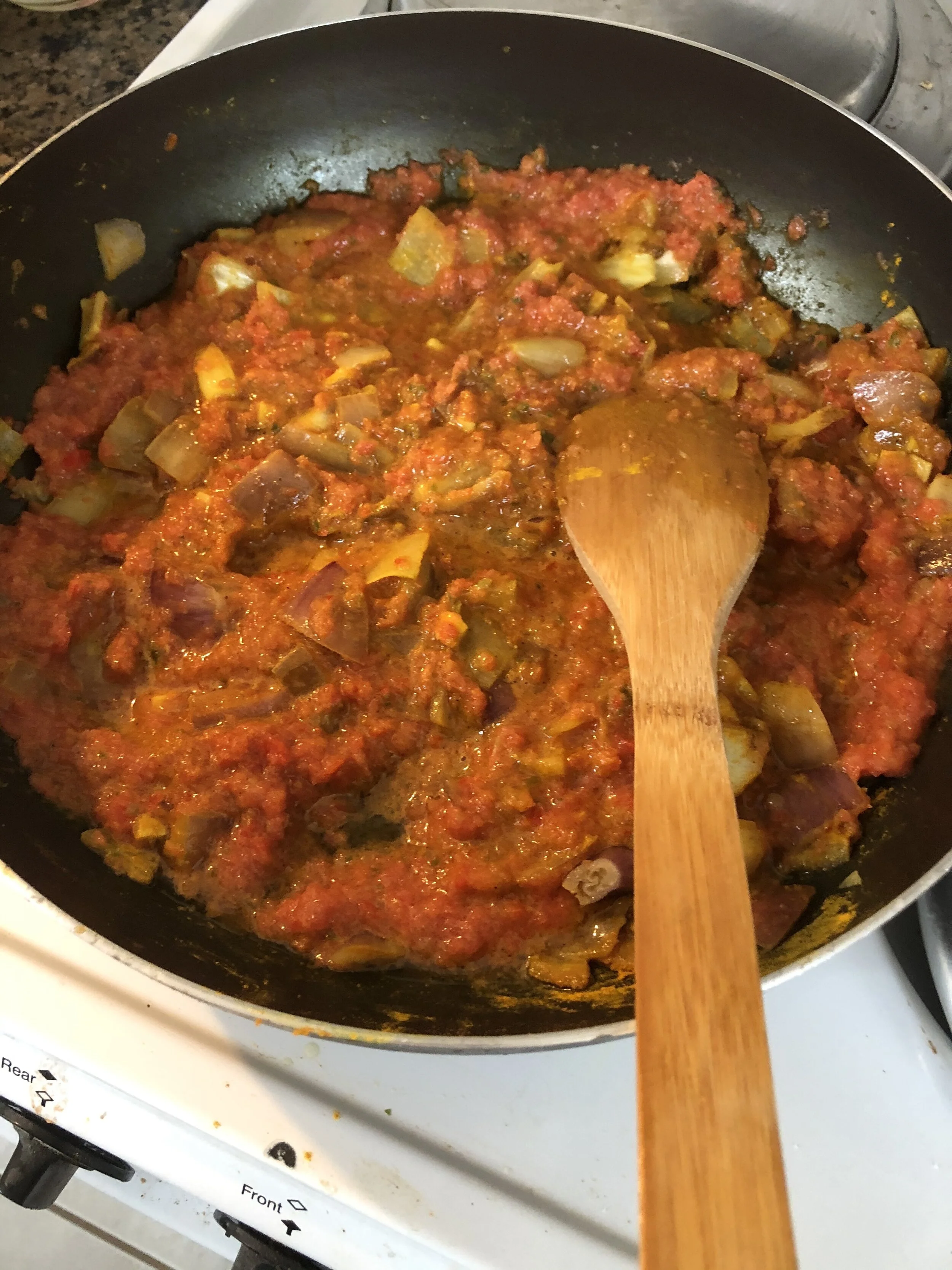 Add the tomato mixture and cook for 9-11 minutes. While the tomatoes are cooking par boil the potatoes and then add the coined carrots and potatoes into the mixture.