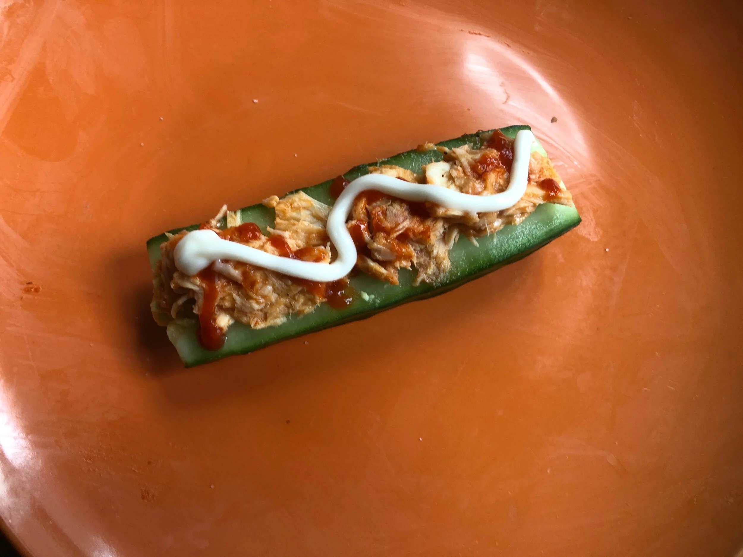 With control, make an additional drizzle of mayonnaise (according to your preference) but you could also use a drizzle of Spanish crema. Using your paring knife, cut into bit sized pieces.