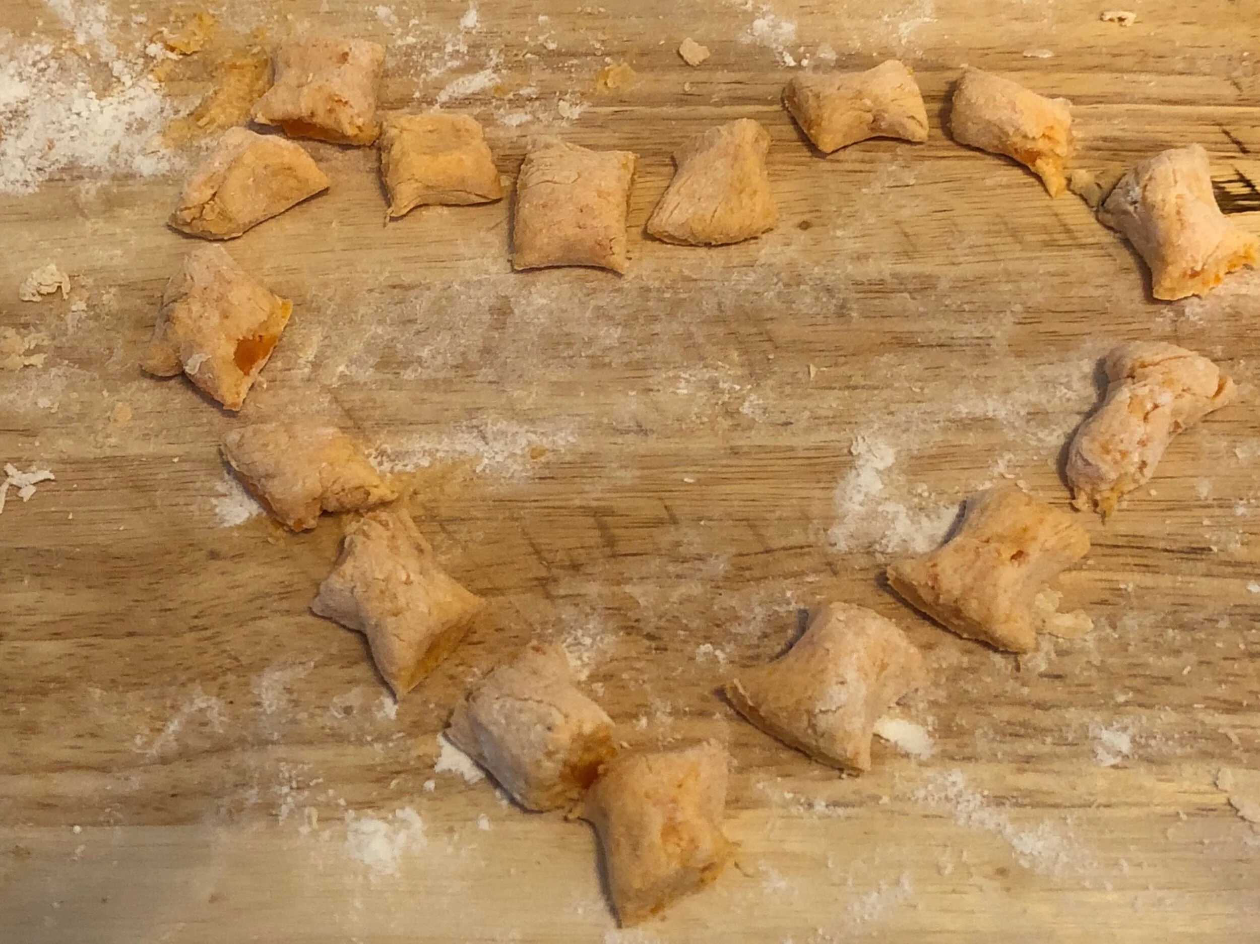 Using your paring knife, cut the log into individual pieces and place them, on a plate or serving platter. Bring a pot of slightly salted water to boil and place the gnocchi in (I did 2 batches). It cooks quicker than you would think, as I discovere…
