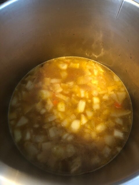 Add the chicken stock, tomato paste, cleaned/coined carrots and bring to a boil. Then add the red lentils and cook for 25-30 minutes, or until the lentils are tender. I cooked mine until they were creamy and totally integrated. Squeeze the lemon hal…