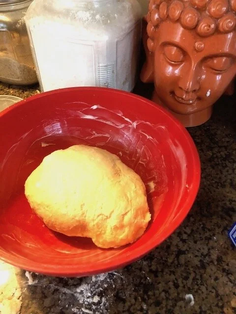 Grease your medium mixing bowl, and place the dough inside. Let the dough stand covered (I covered mine in beeswax wrap) until it doubles in size.